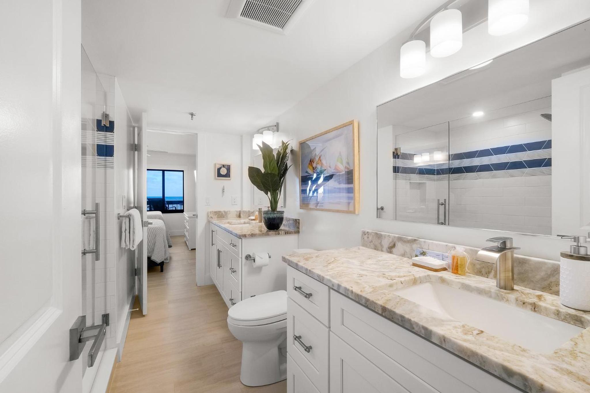 Luxury direct oceanfront corner with large private balcony, heated pool and garage