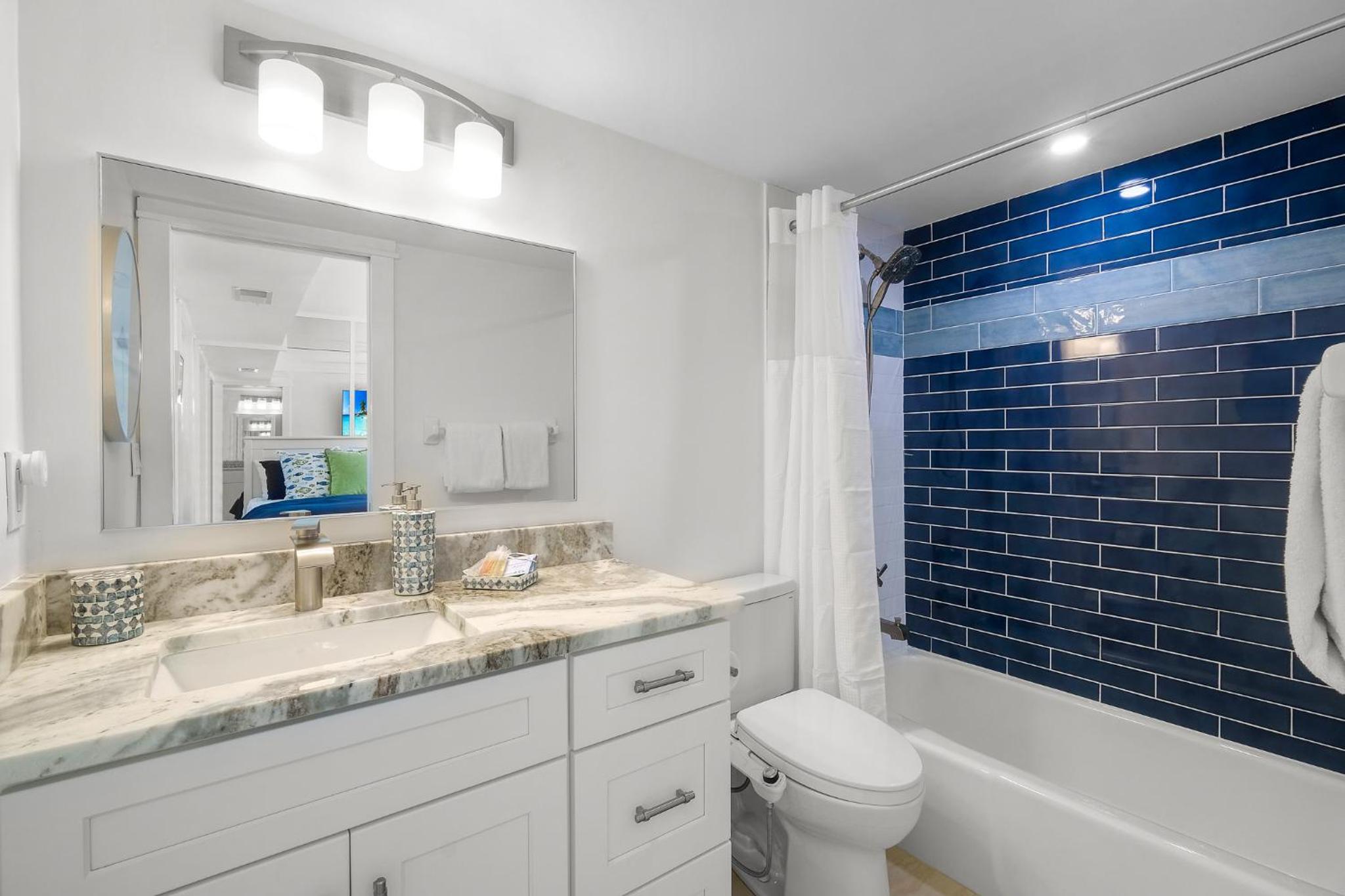 Luxury direct oceanfront corner with large private balcony, heated pool and garage