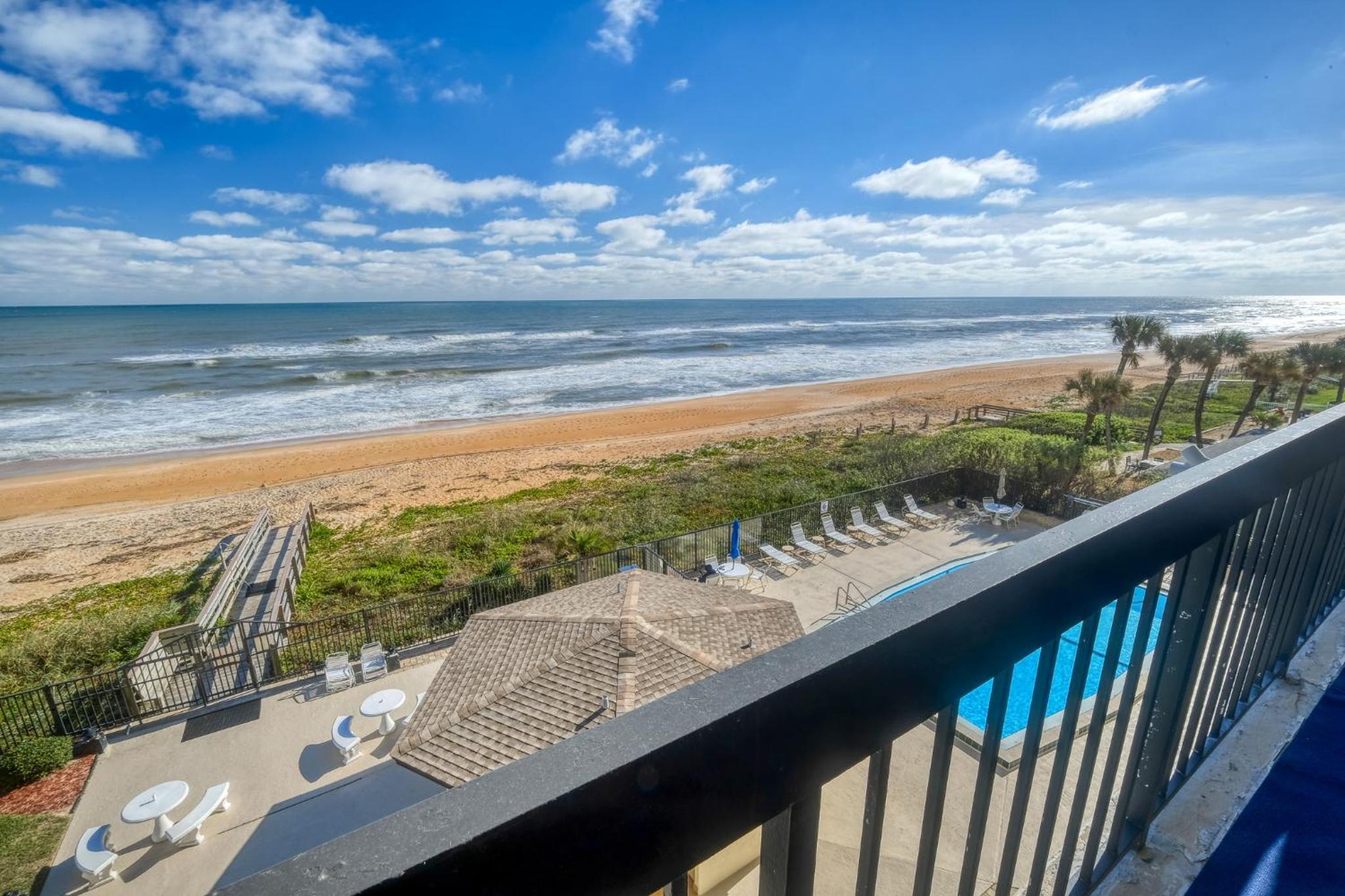 Luxury direct oceanfront corner with large private balcony, heated pool and garage