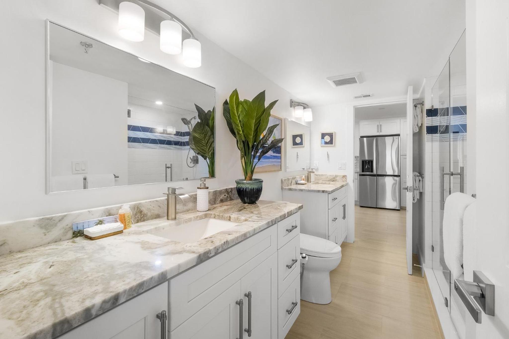 Luxury direct oceanfront corner with large private balcony, heated pool and garage