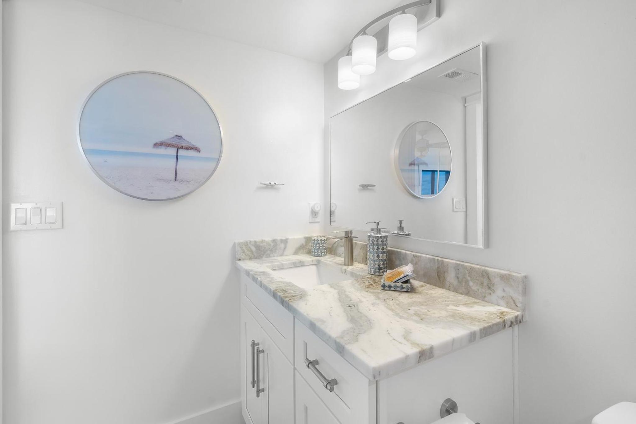Luxury direct oceanfront corner with large private balcony, heated pool and garage
