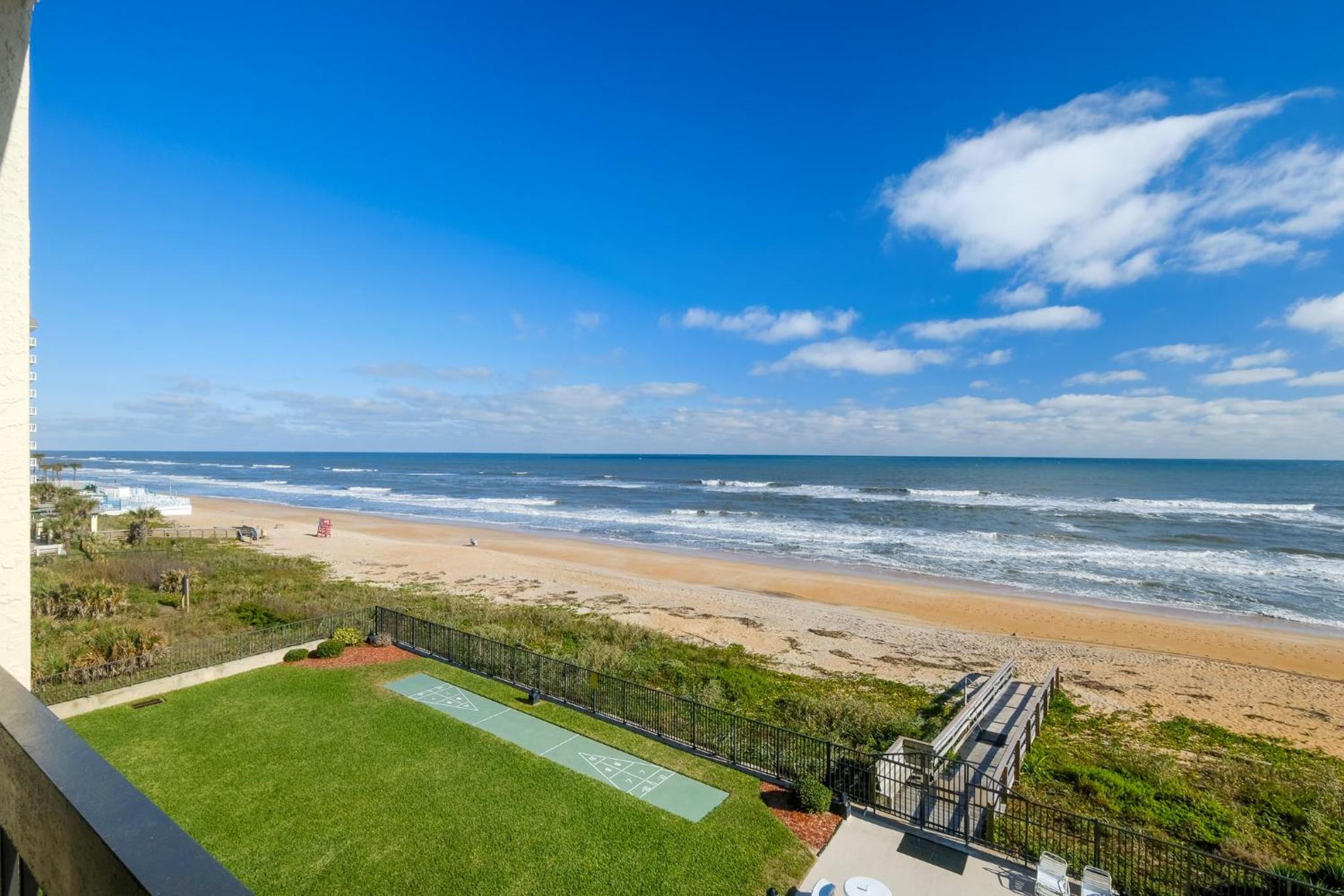Luxury direct oceanfront corner with large private balcony, heated pool and garage