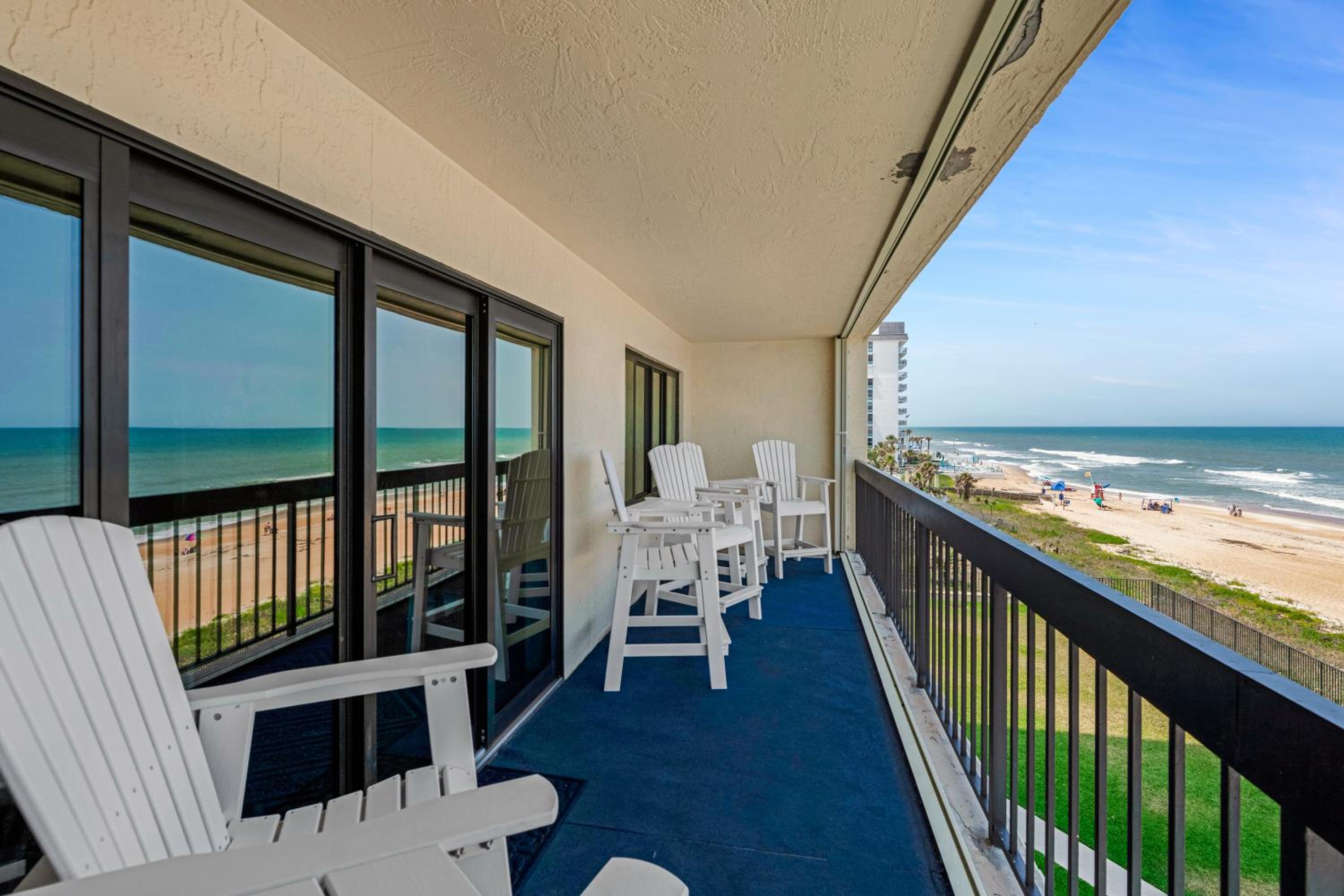 Luxury direct oceanfront corner with large private balcony, heated pool and garage