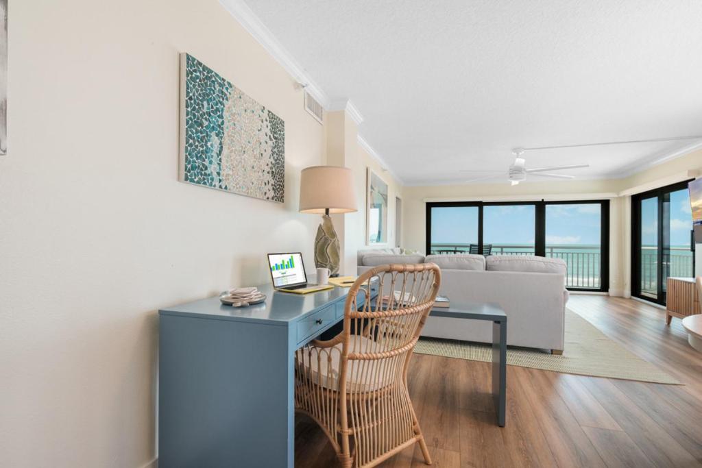 Updated direct oceanfront corner condo with large wrap-around balcony and heated pool