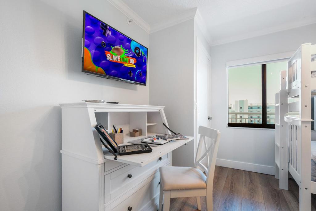 Updated direct oceanfront corner condo with large wrap-around balcony and heated pool