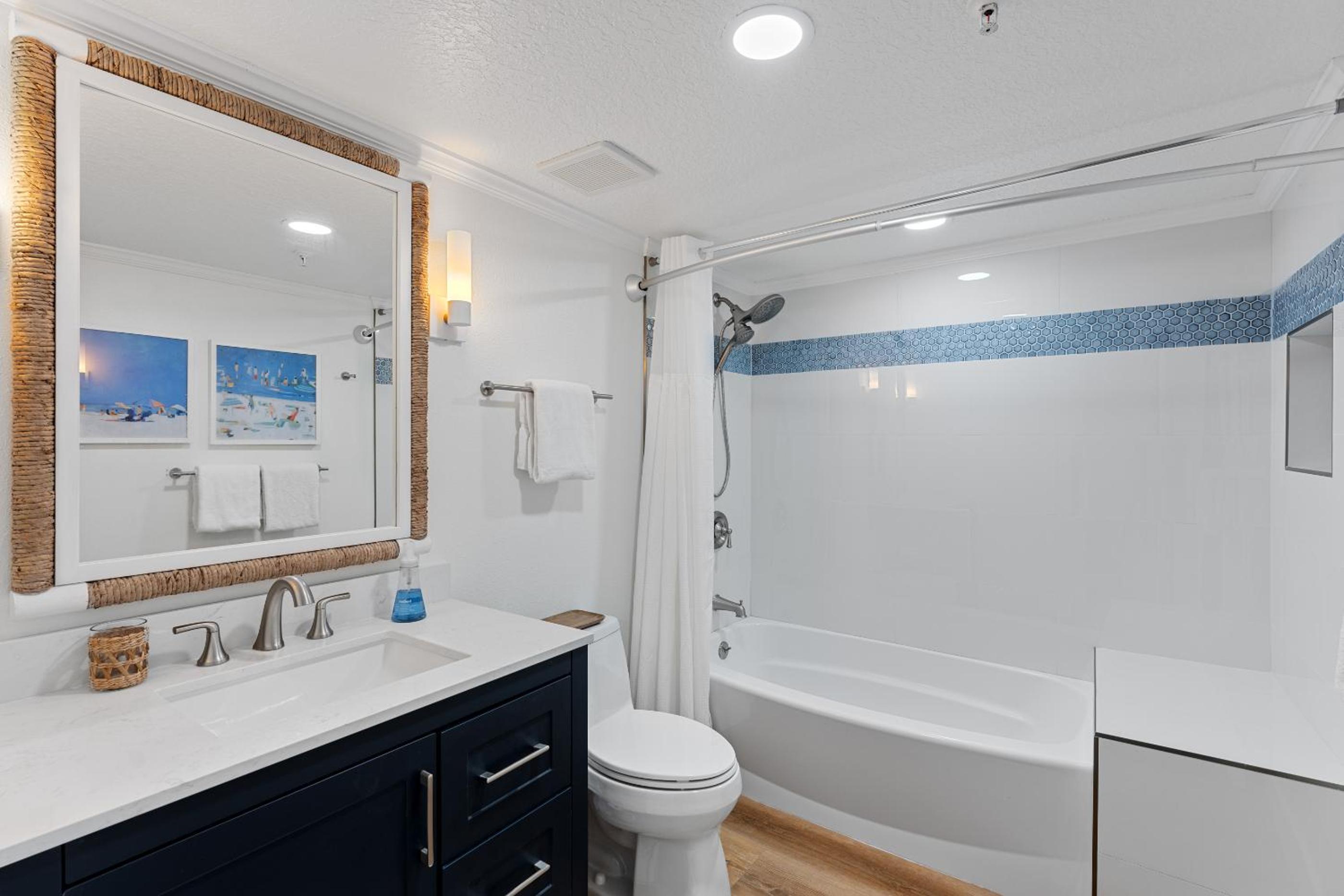 Updated direct oceanfront corner condo with large wrap-around balcony and heated pool