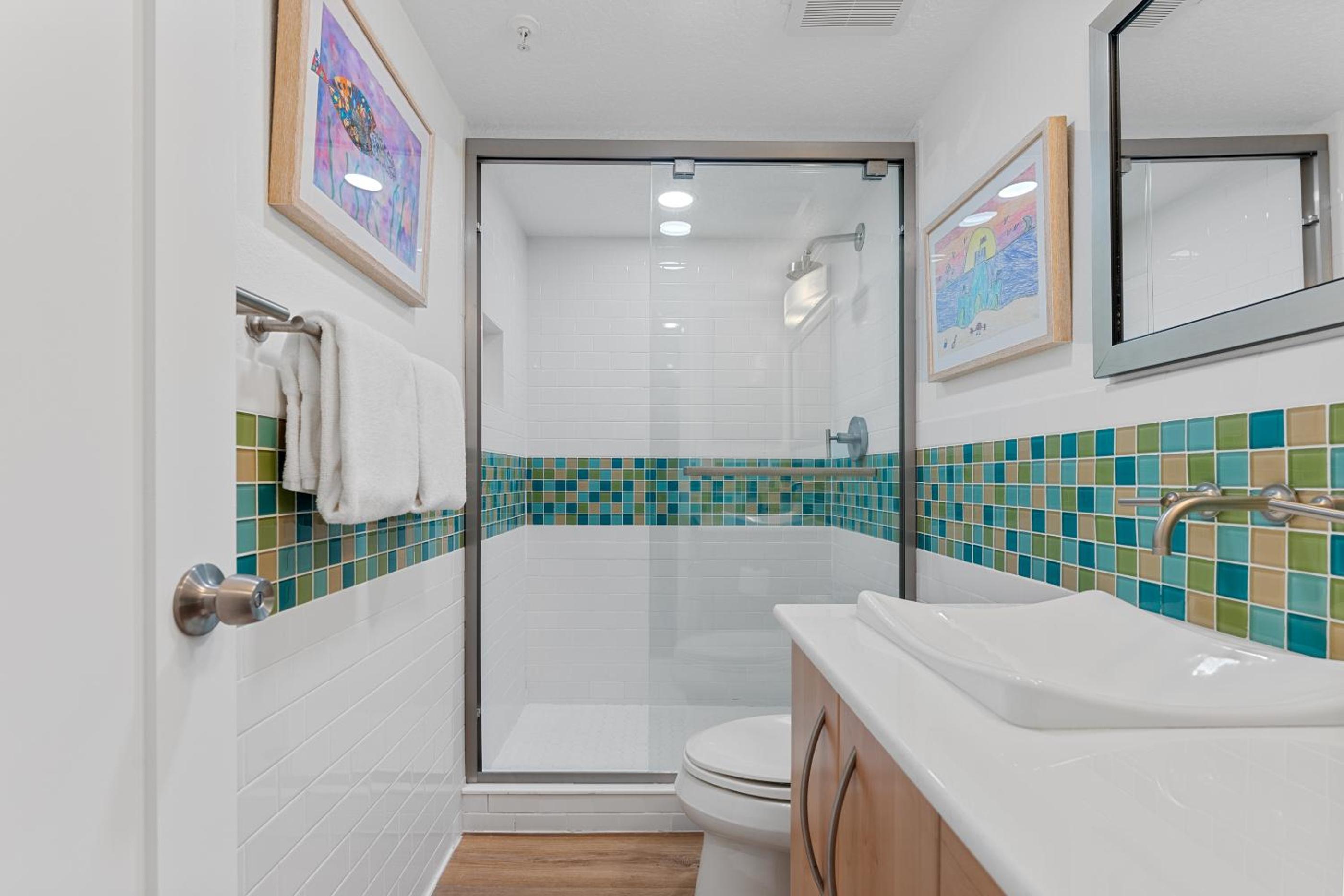 Updated direct oceanfront corner condo with large wrap-around balcony and heated pool