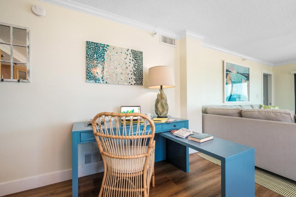 Updated direct oceanfront corner condo with large wrap-around balcony and heated pool