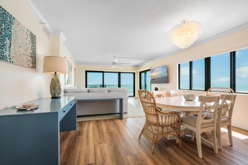 Updated direct oceanfront corner condo with large wrap-around balcony and heated pool