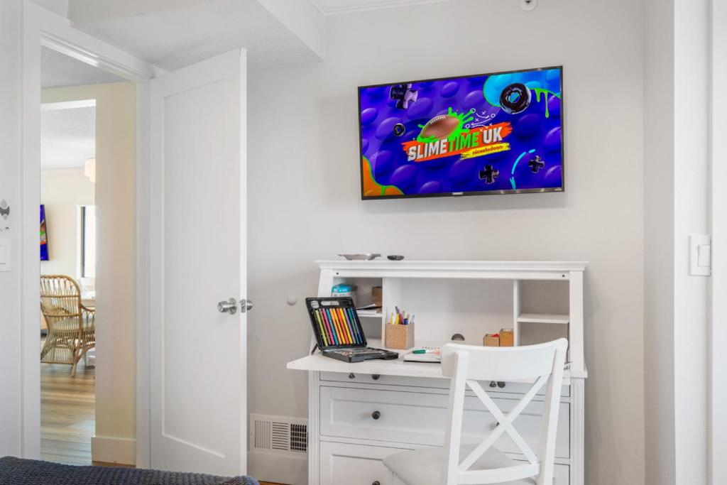 Updated direct oceanfront corner condo with large wrap-around balcony and heated pool