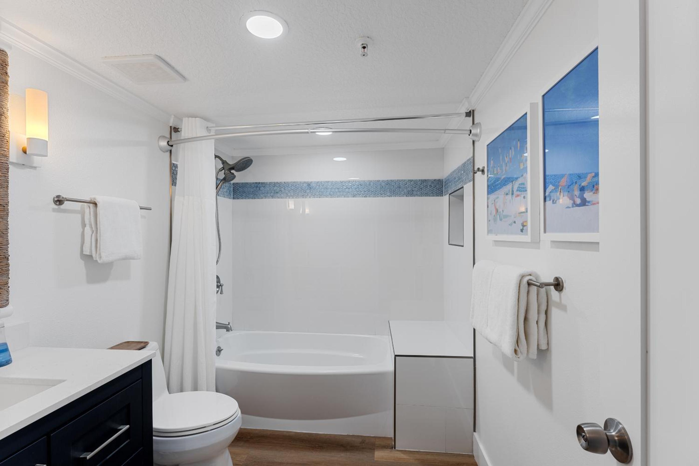 Updated direct oceanfront corner condo with large wrap-around balcony and heated pool