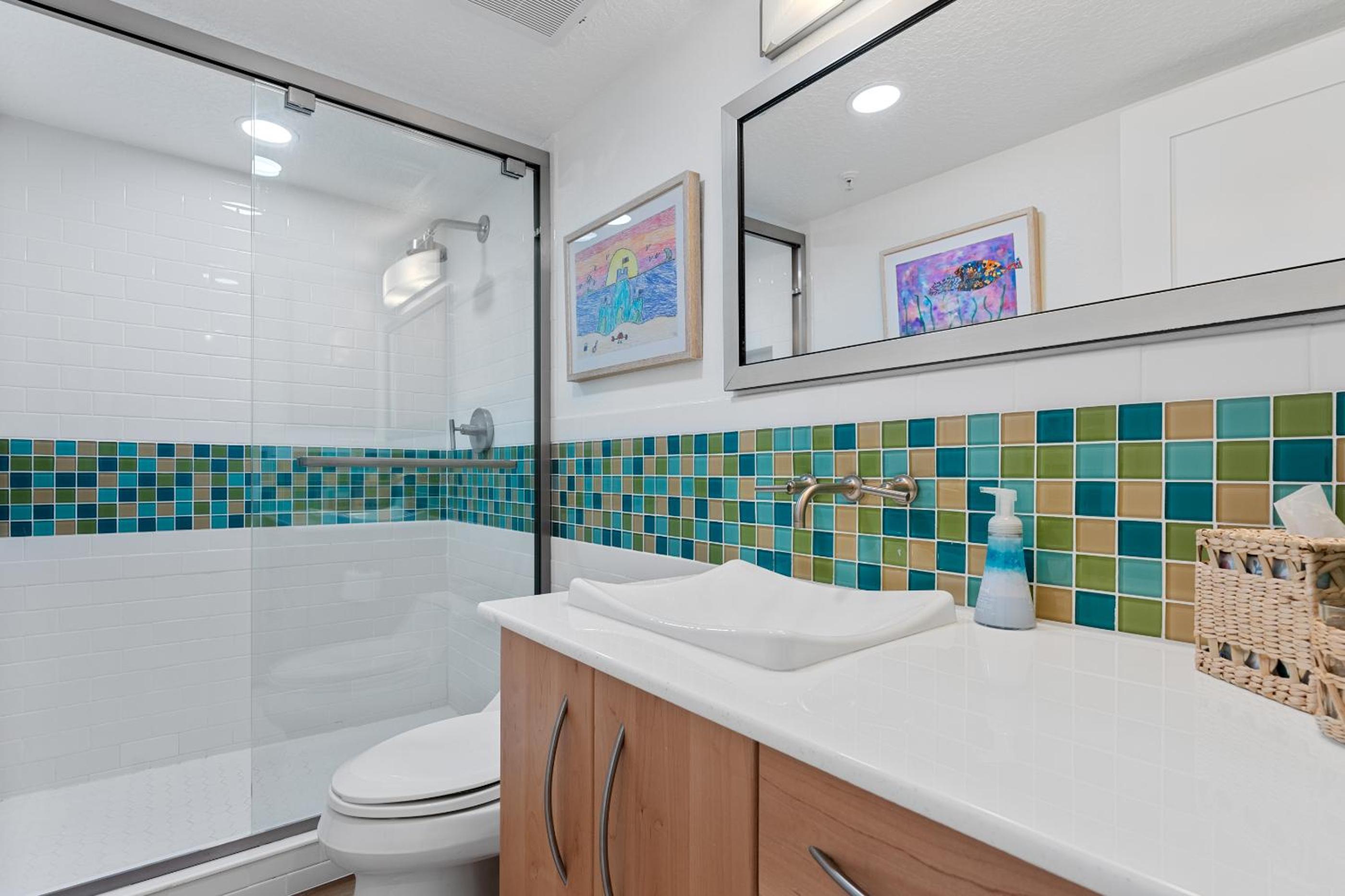 Updated direct oceanfront corner condo with large wrap-around balcony and heated pool