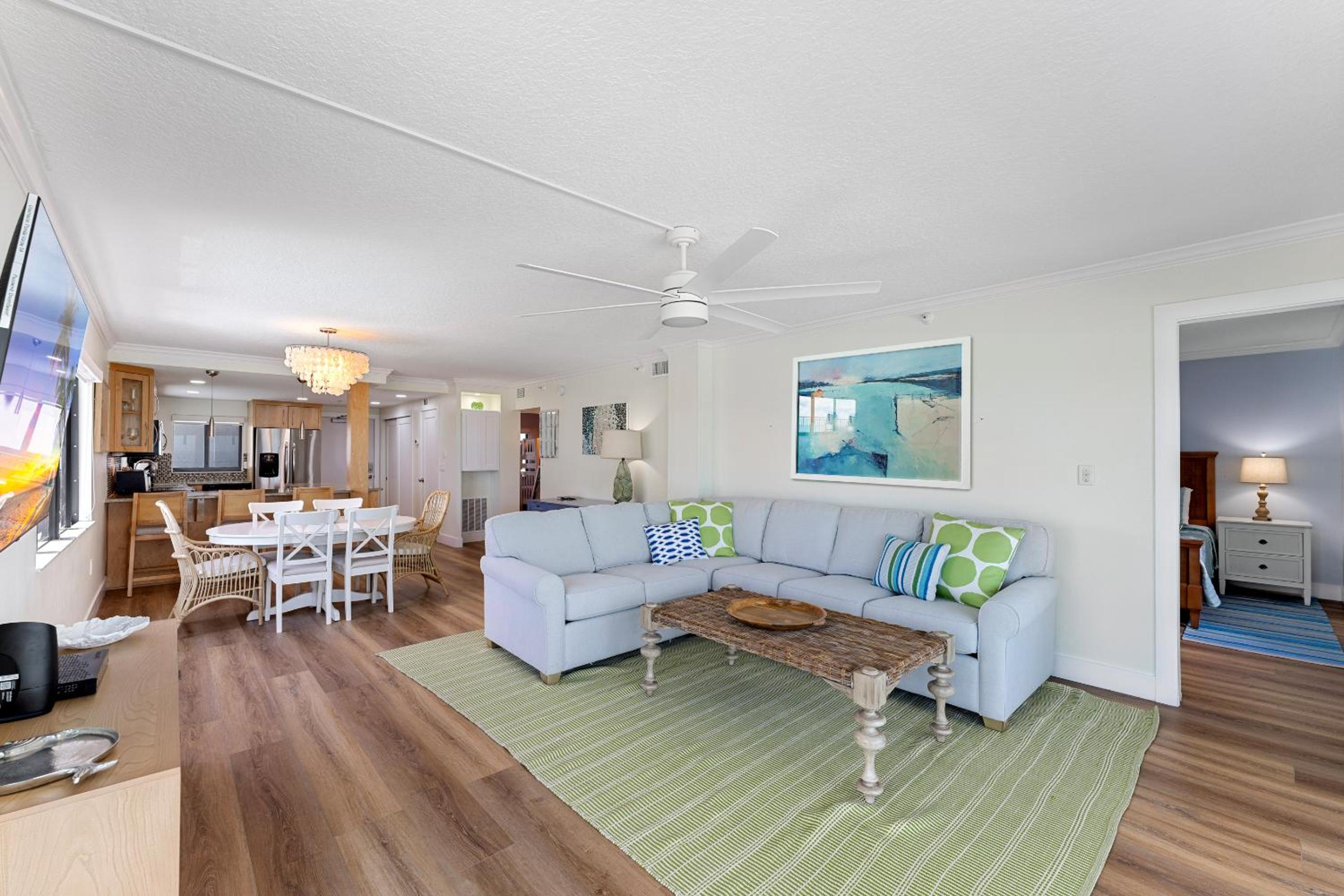 Updated direct oceanfront corner condo with large wrap-around balcony and heated pool