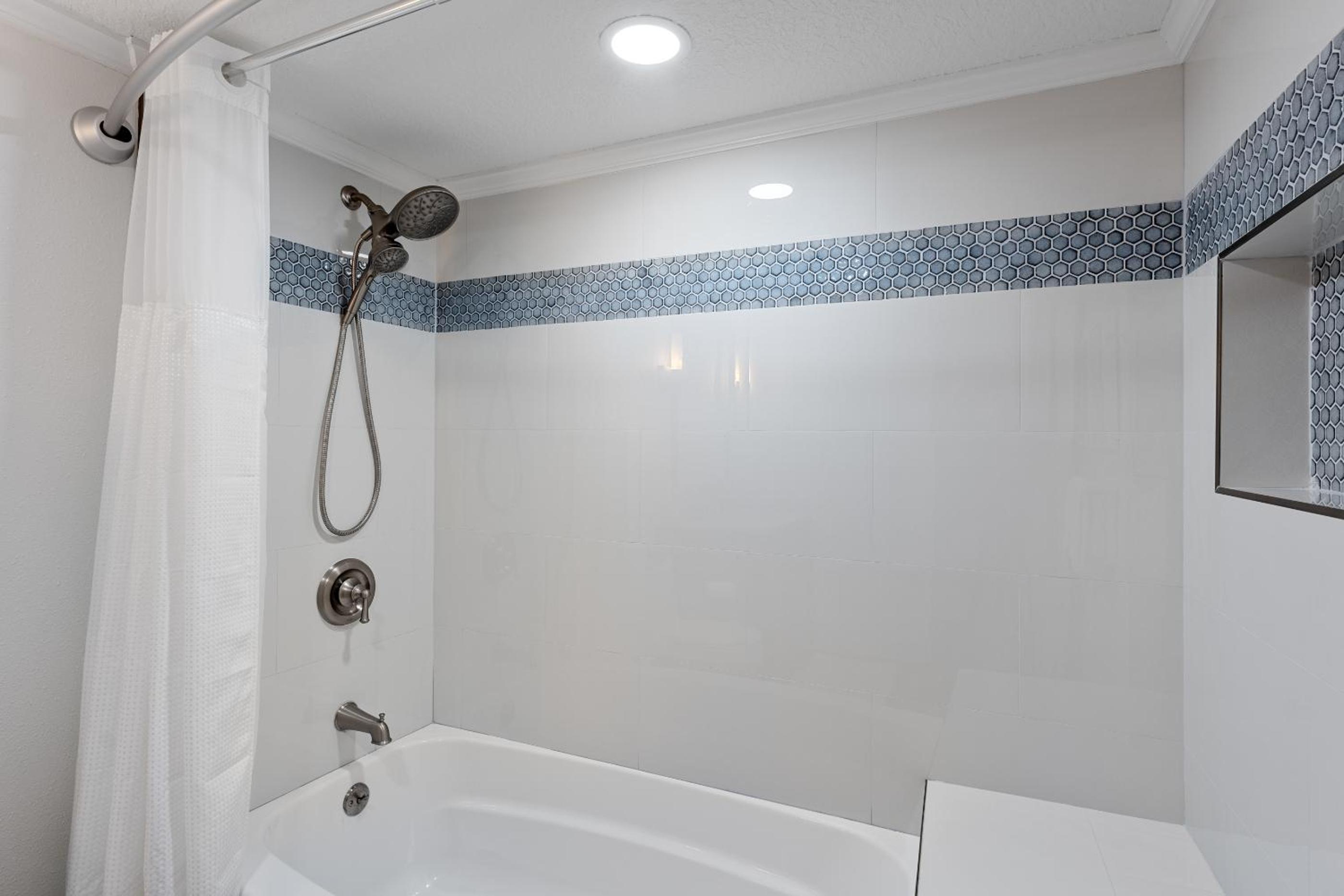 Updated direct oceanfront corner condo with large wrap-around balcony and heated pool