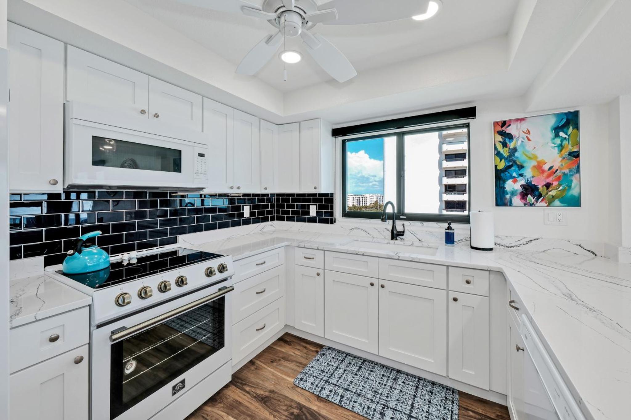 Direct oceanfront corner penthouse with huge wrap-around balcony offering beach and pool views