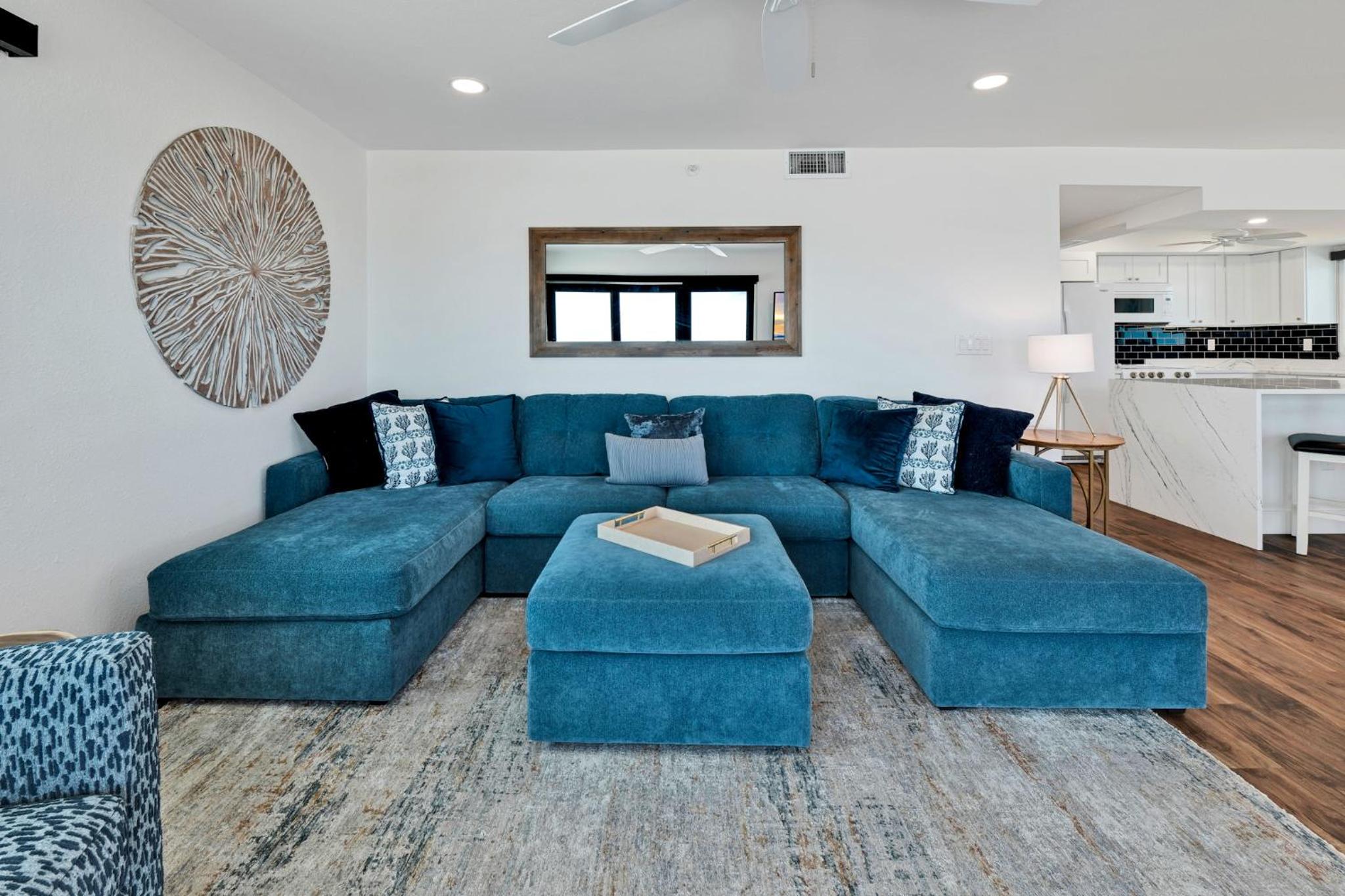 Direct oceanfront corner penthouse with huge wrap-around balcony offering beach and pool views