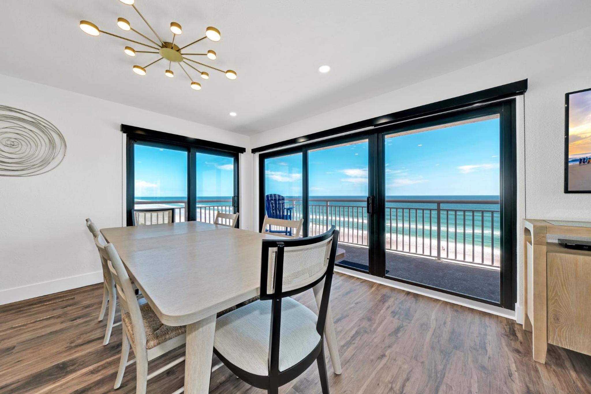 Direct oceanfront corner penthouse with huge wrap-around balcony offering beach and pool views