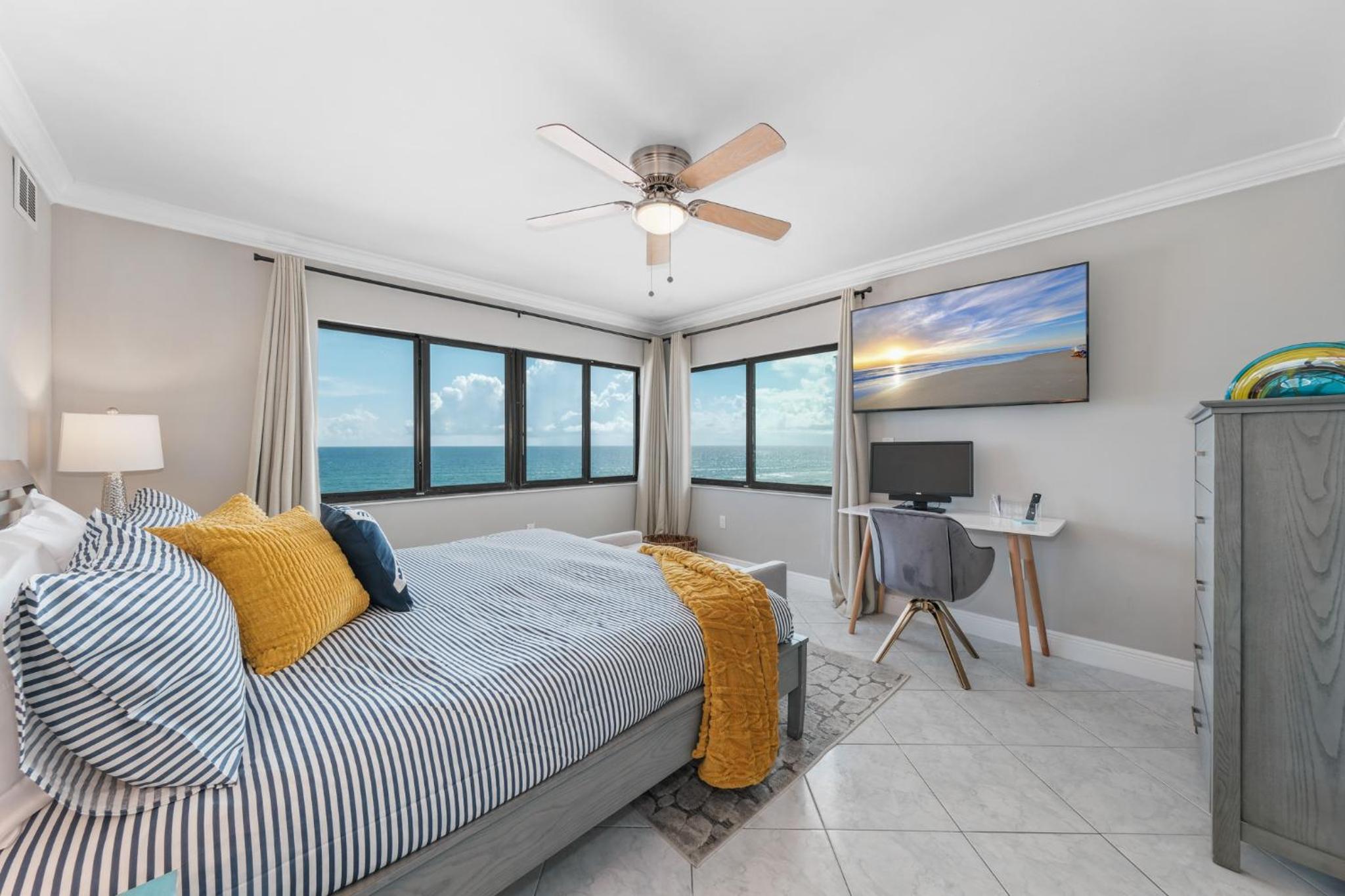 Updated direct oceanfront corner condo with a wrap-around balcony overlooking the heated pool