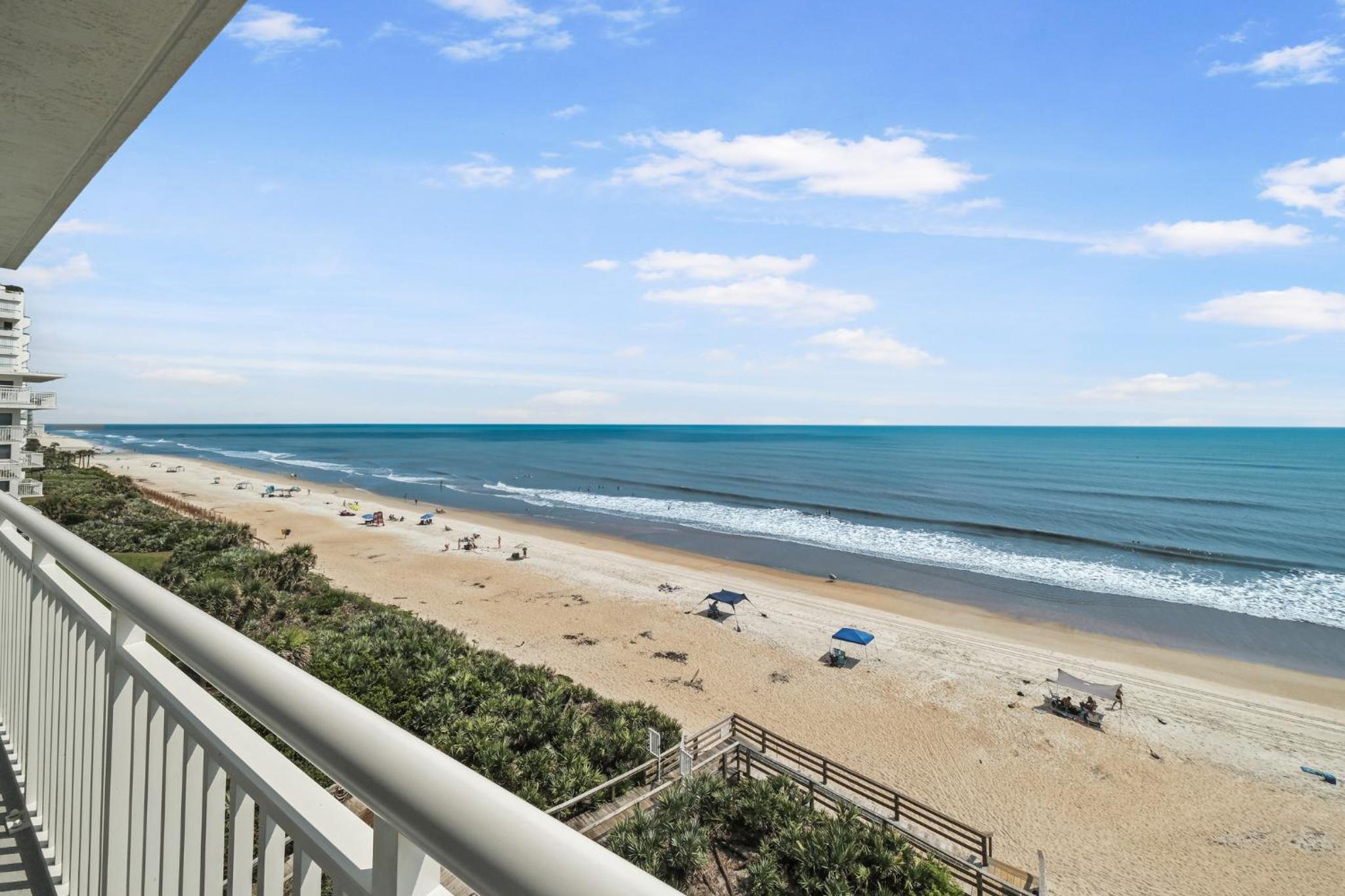 Updated direct oceanfront corner condo with a wrap-around balcony overlooking the heated pool
