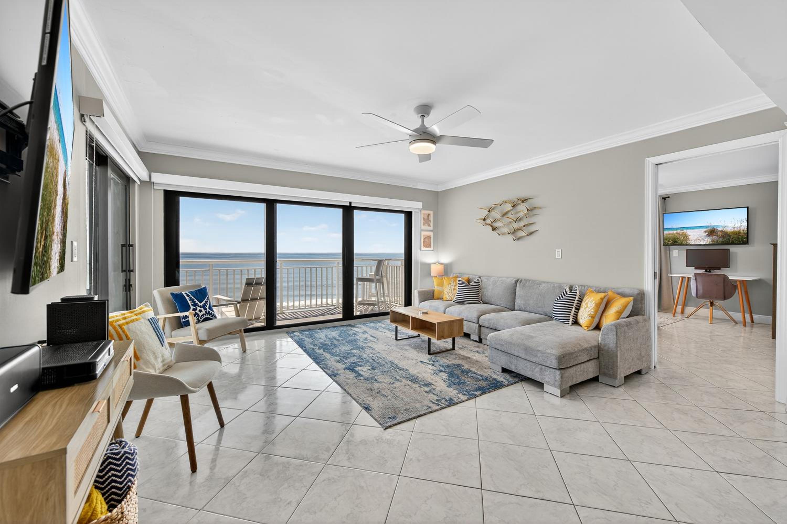 Updated direct oceanfront corner condo with a wrap-around balcony overlooking the heated pool