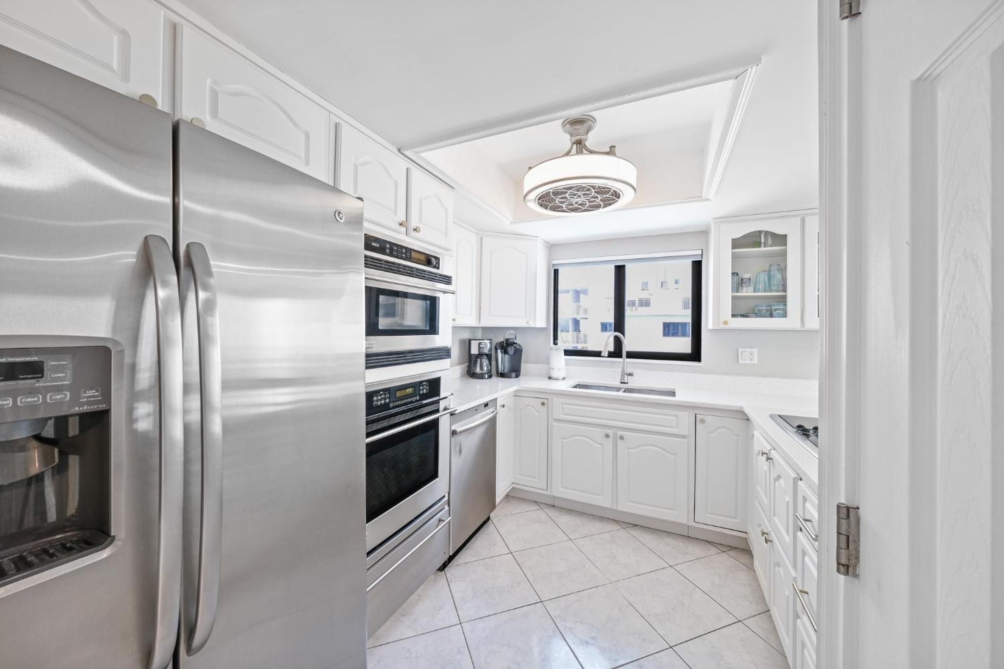 Updated direct oceanfront corner condo with a wrap-around balcony overlooking the heated pool
