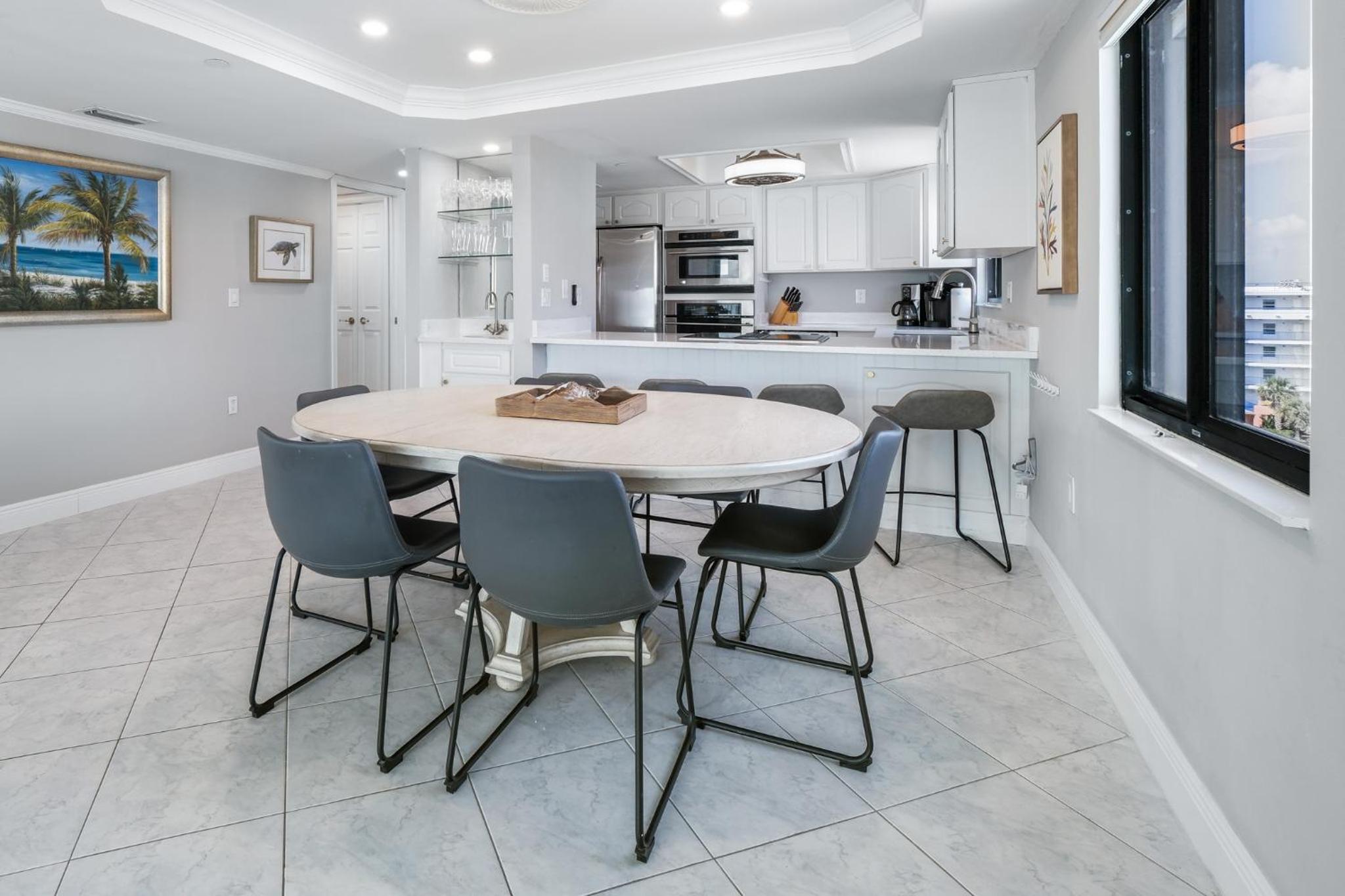 Updated direct oceanfront corner condo with a wrap-around balcony overlooking the heated pool