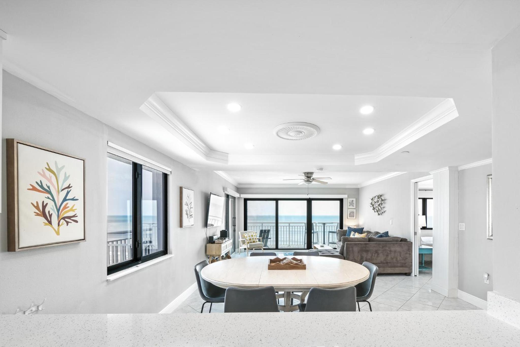 Updated direct oceanfront corner condo with a wrap-around balcony overlooking the heated pool