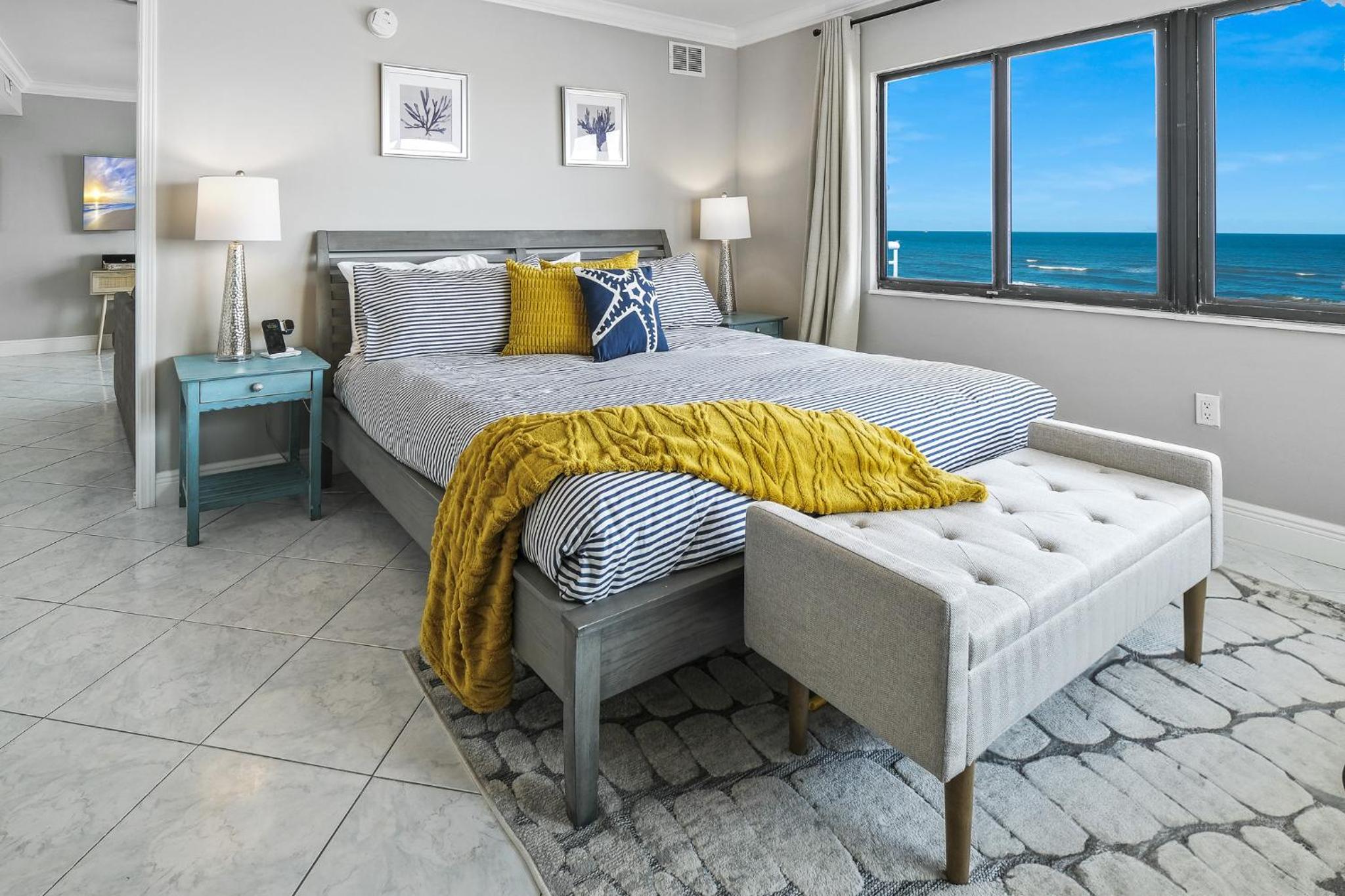 Updated direct oceanfront corner condo with a wrap-around balcony overlooking the heated pool