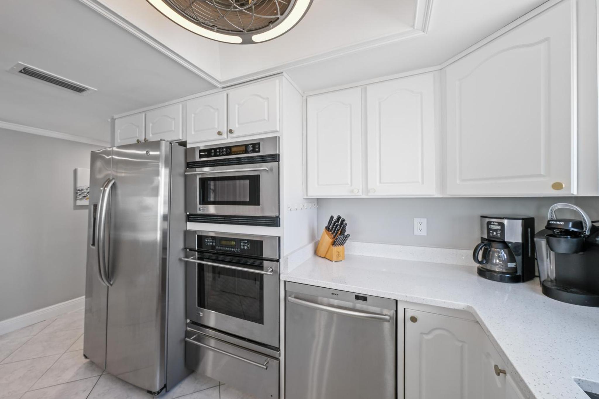 Updated direct oceanfront corner condo with a wrap-around balcony overlooking the heated pool