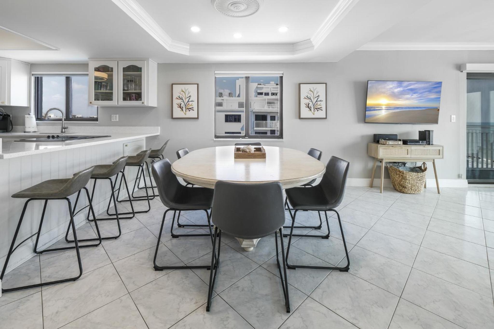 Updated direct oceanfront corner condo with a wrap-around balcony overlooking the heated pool