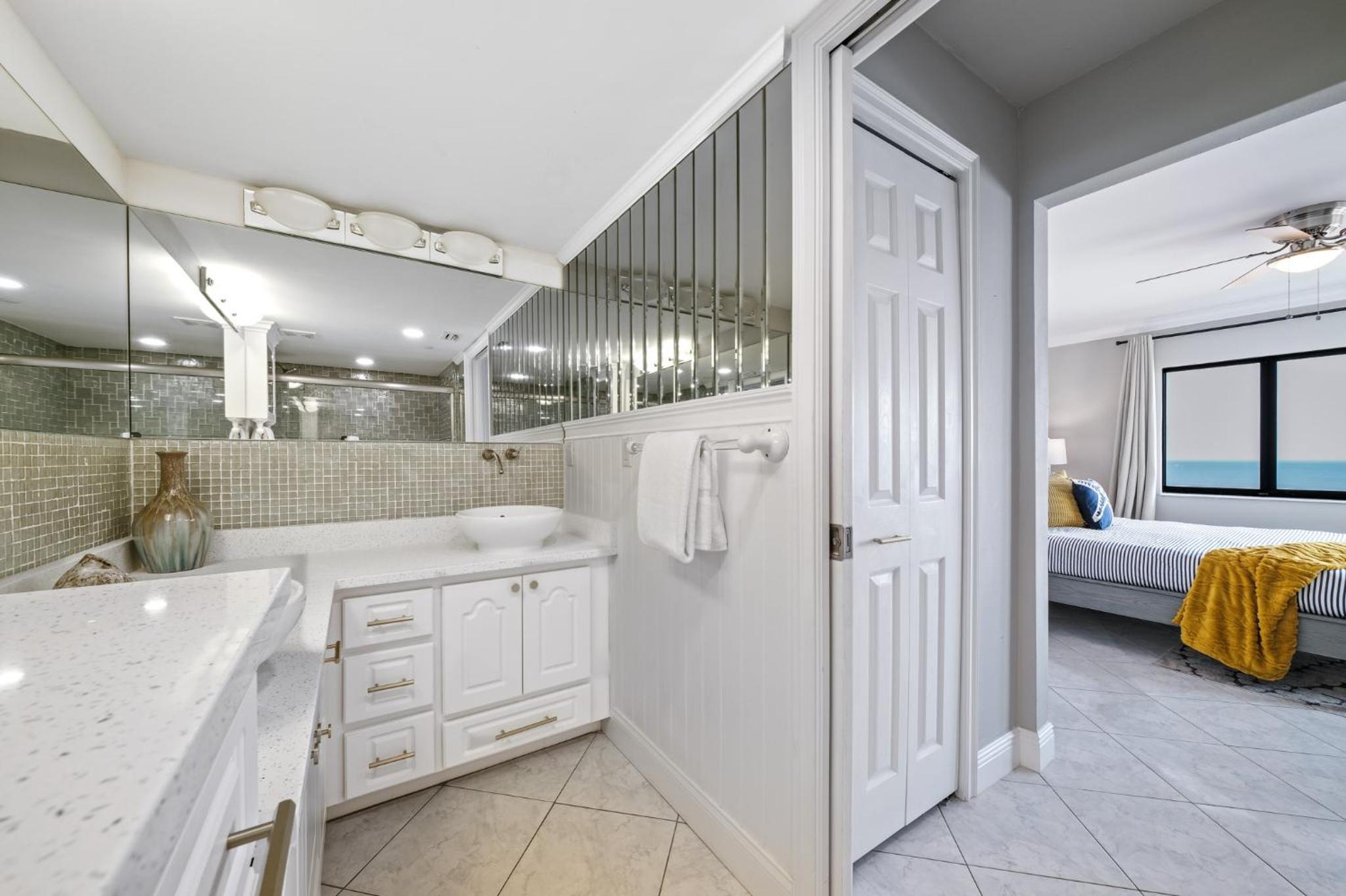 Updated direct oceanfront corner condo with a wrap-around balcony overlooking the heated pool