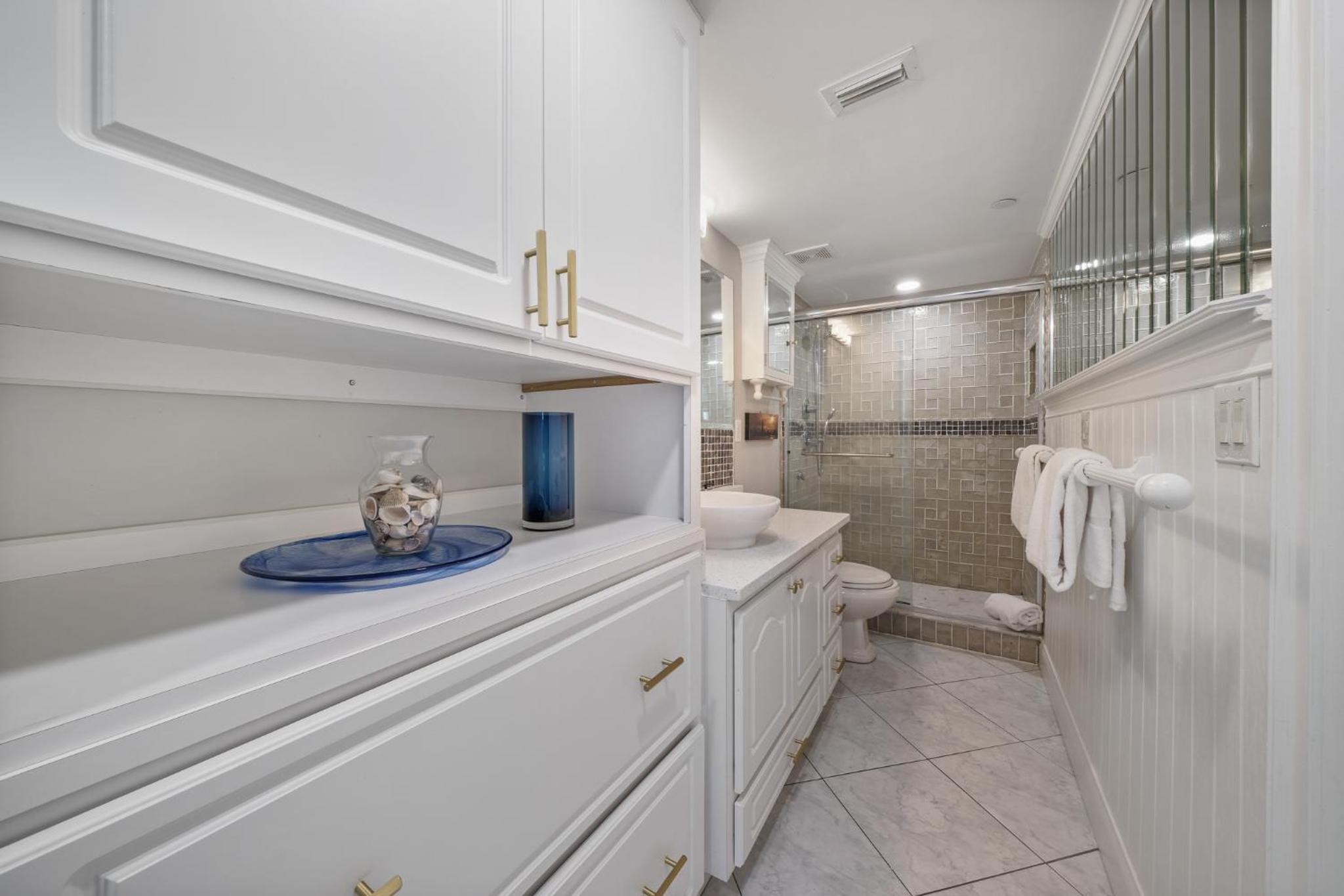 Updated direct oceanfront corner condo with a wrap-around balcony overlooking the heated pool