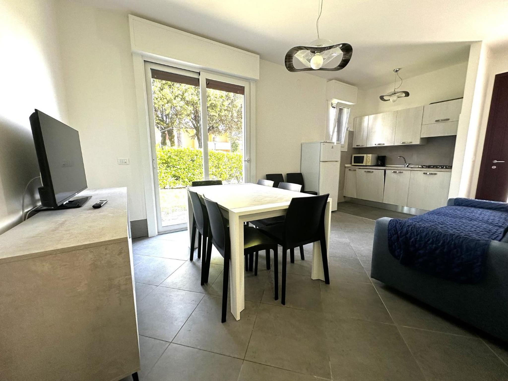 Villa with garden and pool access in Bibione