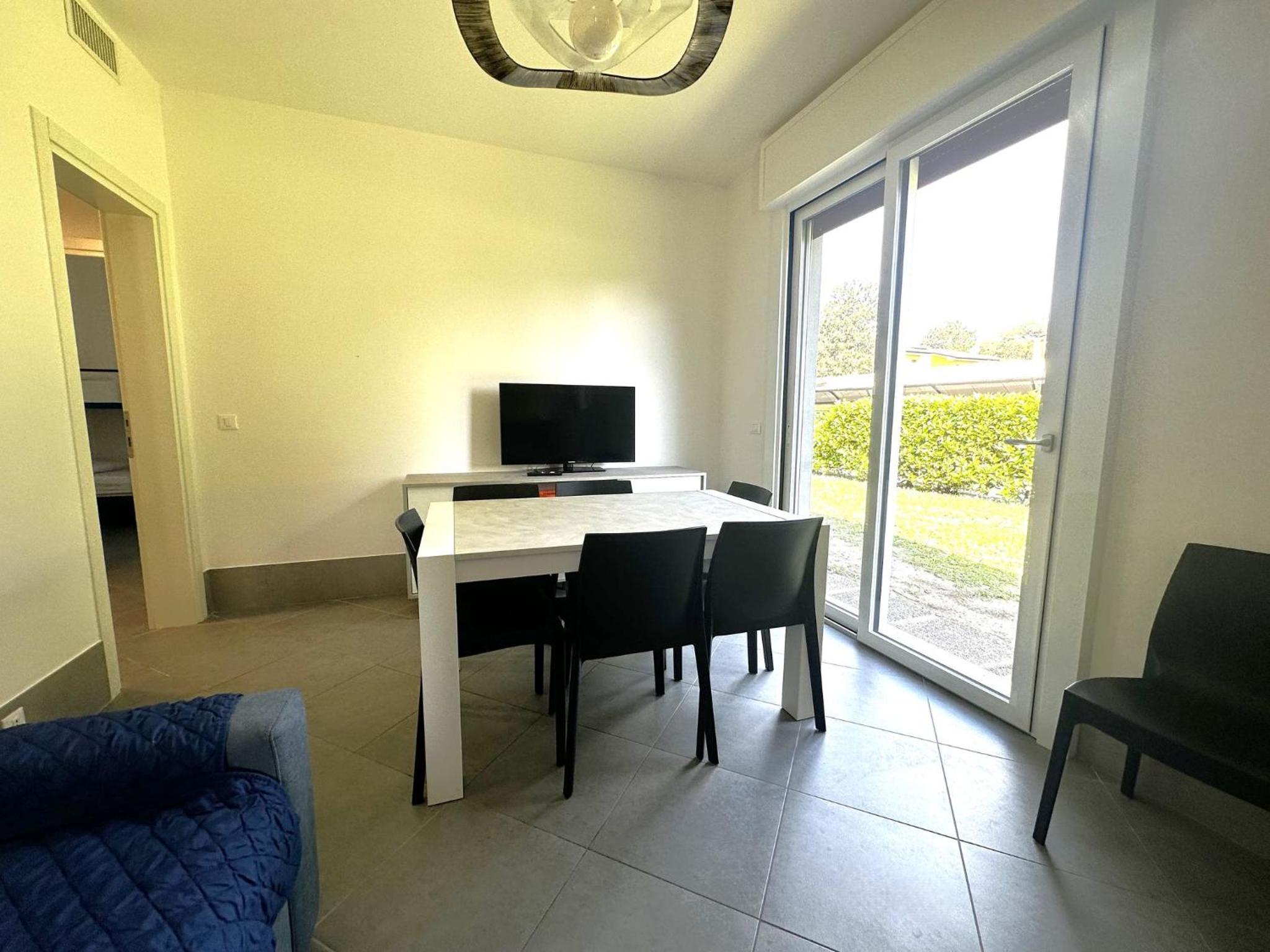 Villa with garden and pool access in Bibione