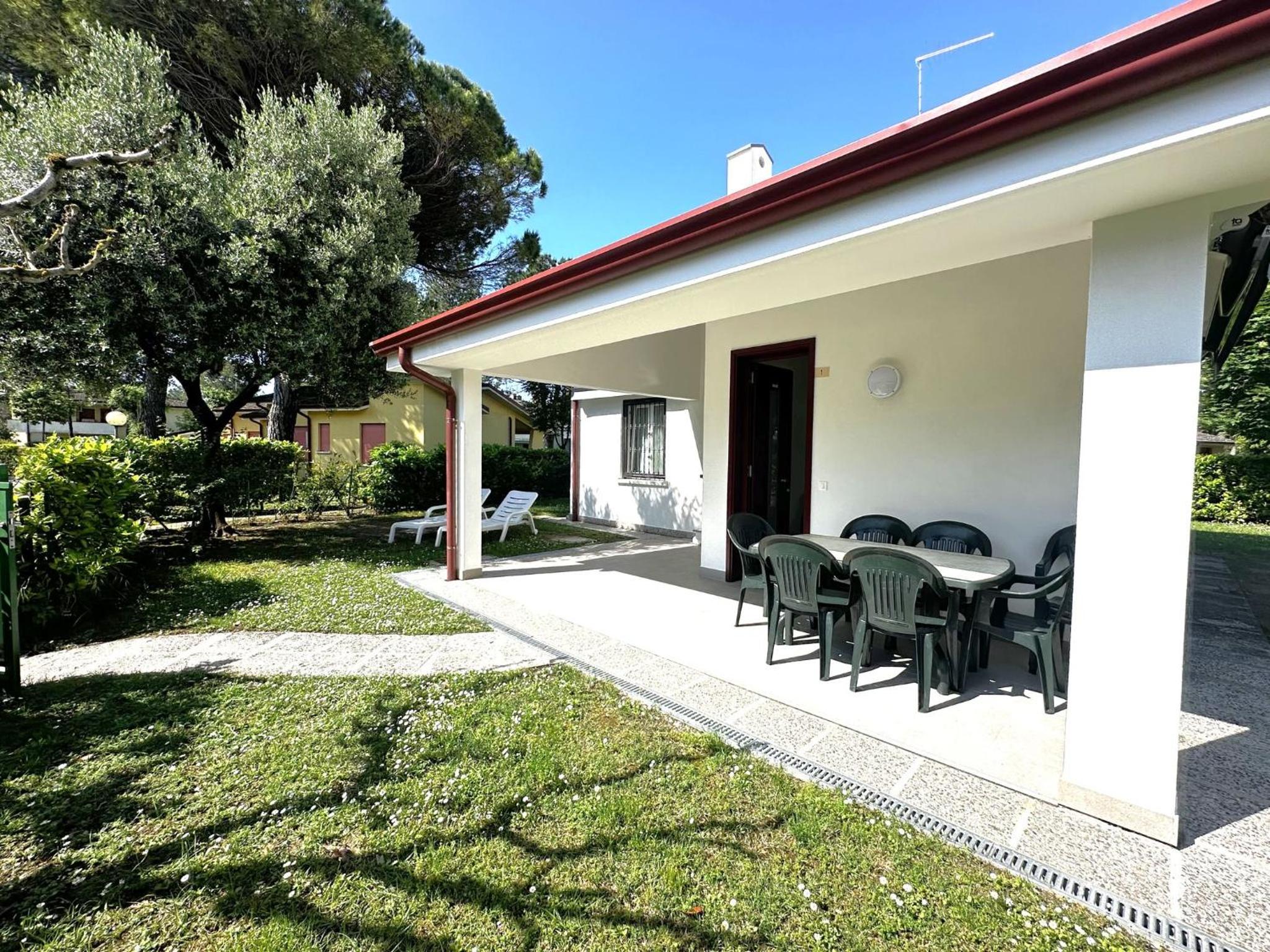 Villa with garden and pool access in Bibione
