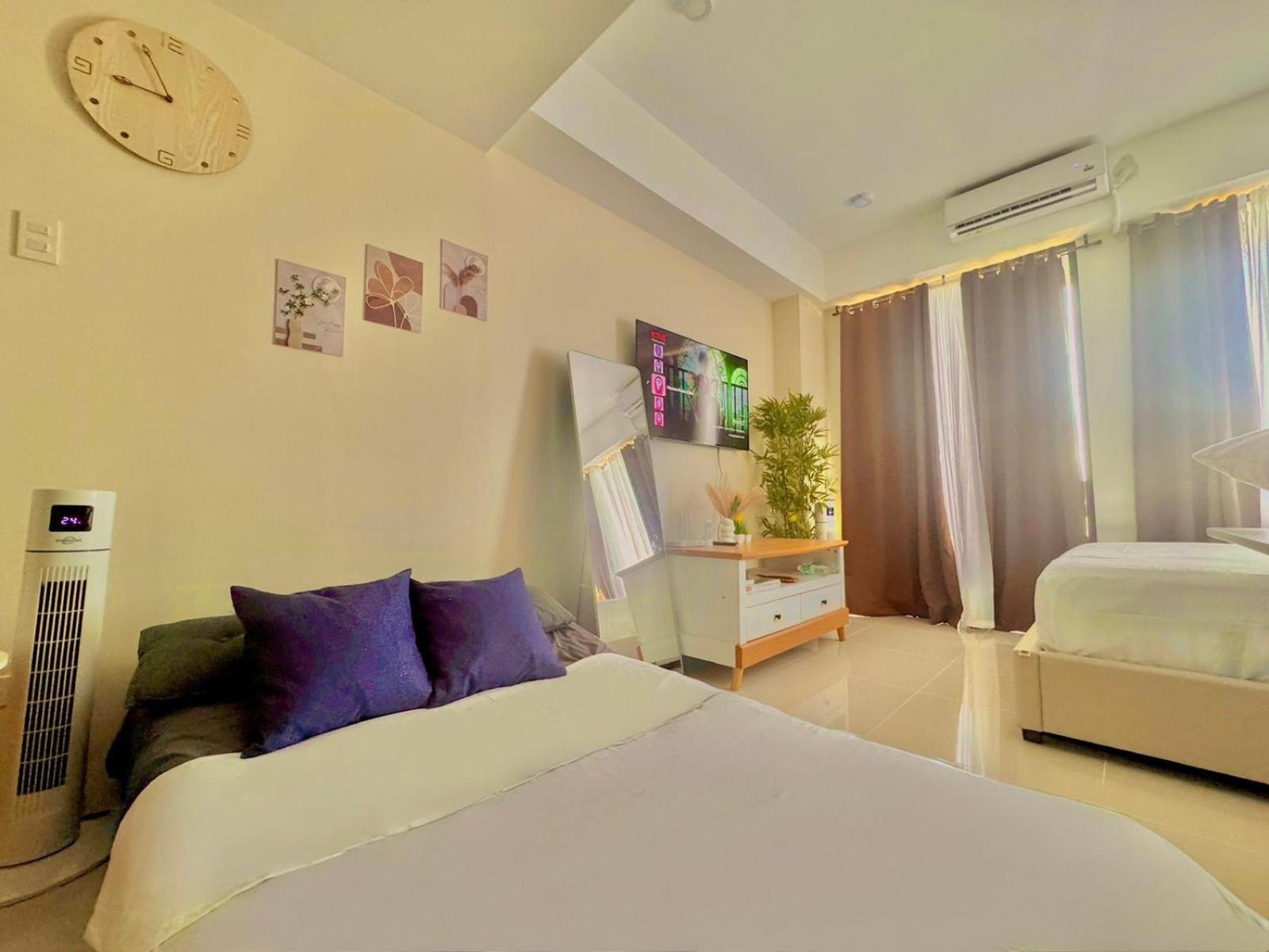 Luxe Bed Free Wi-Fi Movie streaming Pool Gym Near Airport and Mactan Newtown