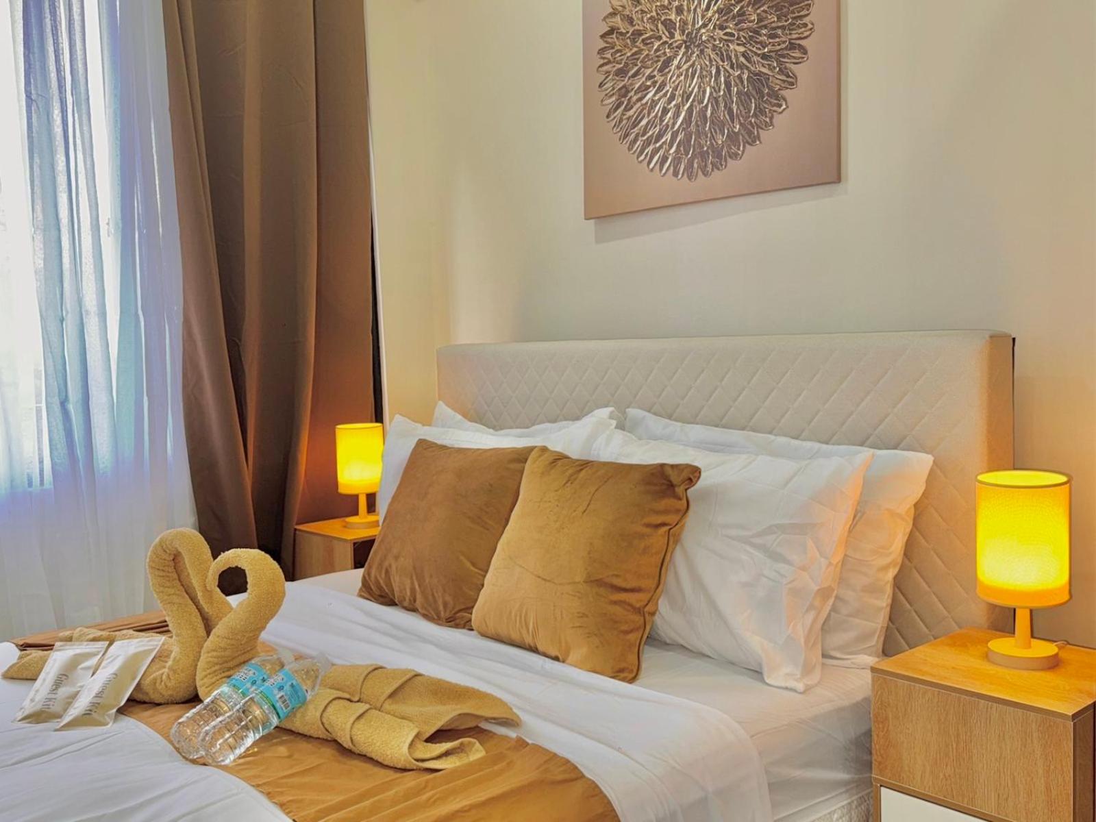 Luxe Bed Free Wi-Fi Movie streaming Pool Gym Near Airport and Mactan Newtown