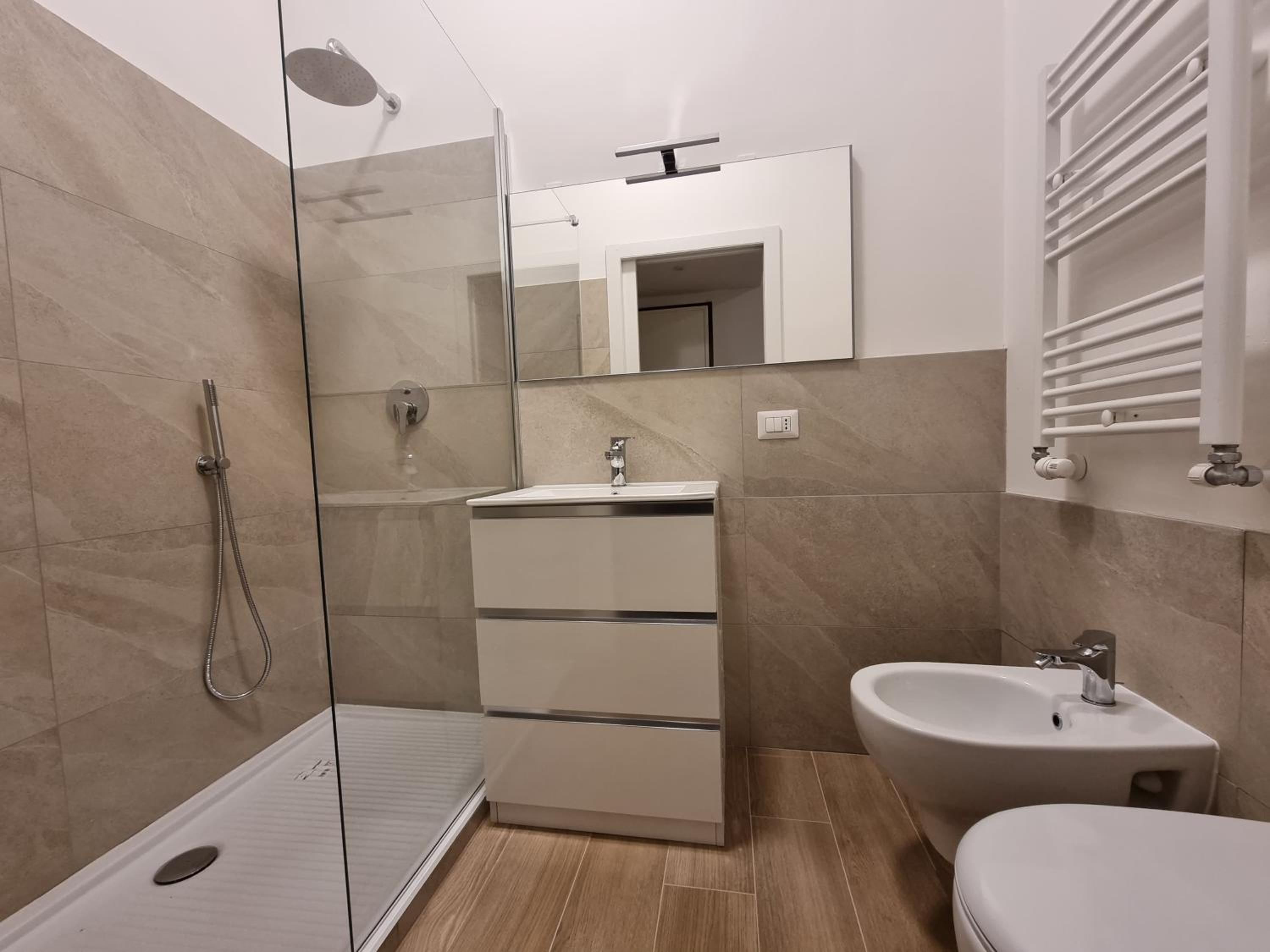 Elegant and modern two-room apartment with equipped kitchen