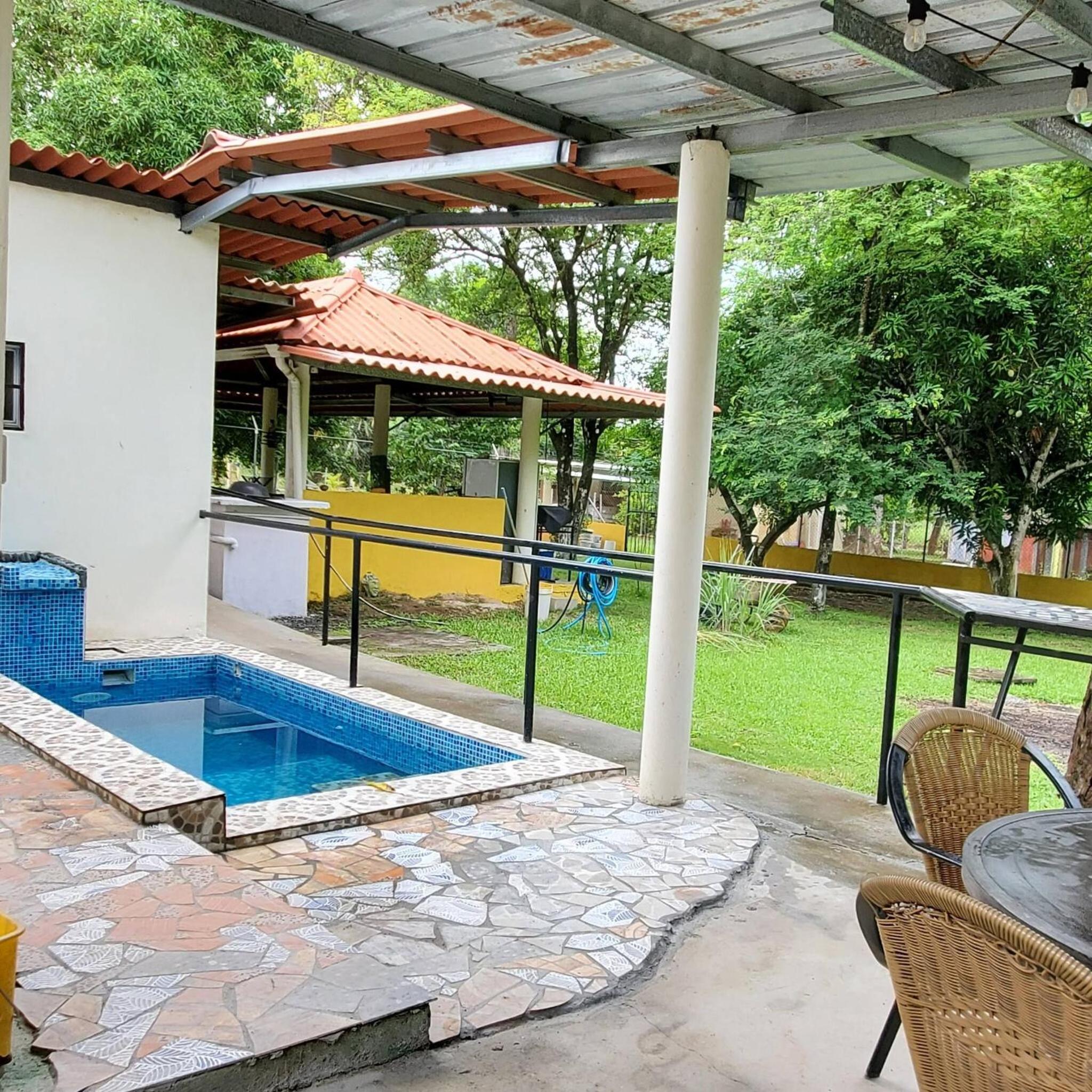 cozy corner with pool minutes away from the beach