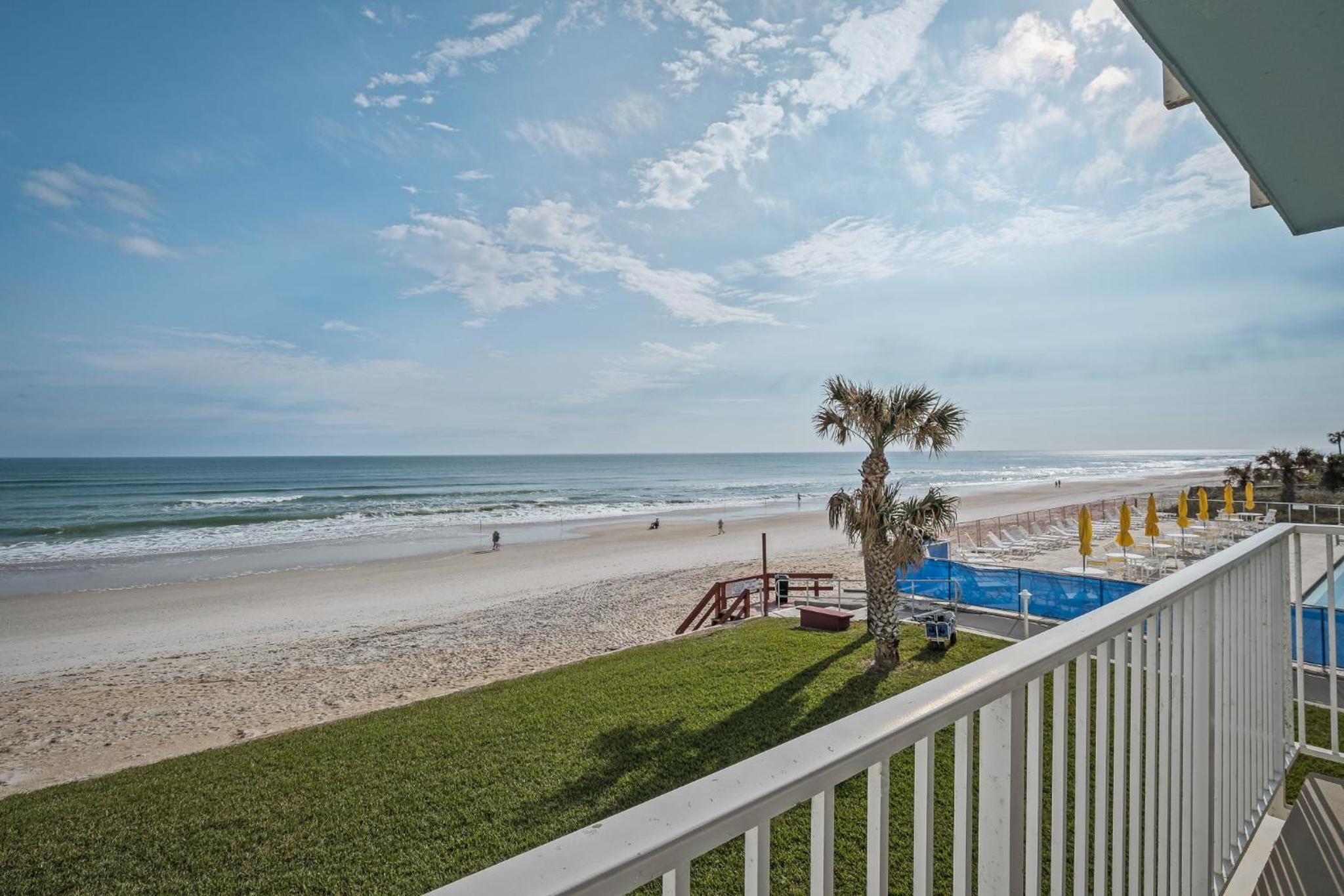 New listing! Direct oceanfront condo with a balcony, heated pool, and tennis court