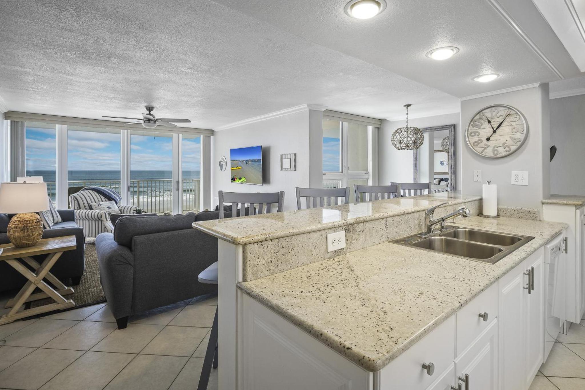 New listing! Direct oceanfront condo with a balcony, heated pool, and tennis court