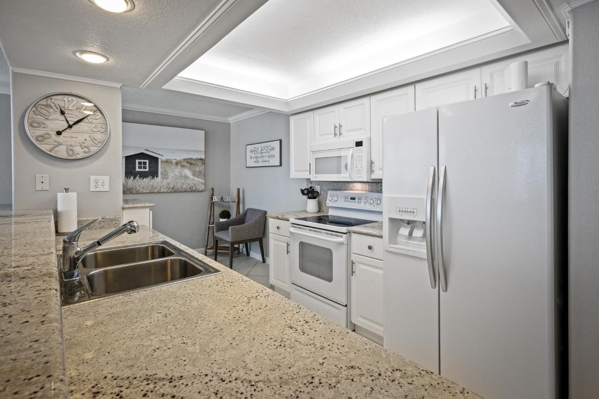 New listing! Direct oceanfront condo with a balcony, heated pool, and tennis court
