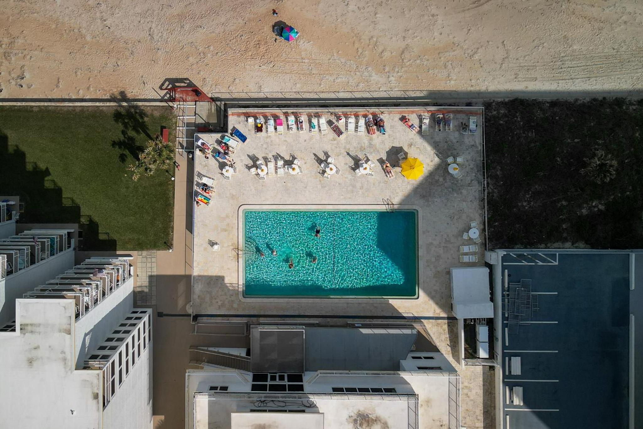 New listing! Direct oceanfront condo with a balcony, heated pool, and tennis court