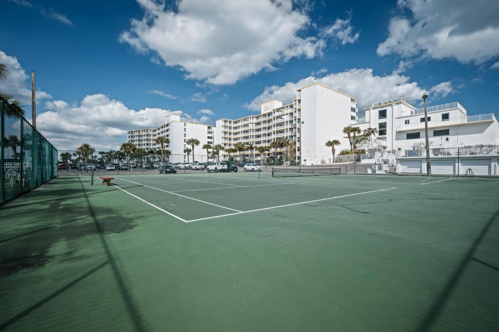 New listing! Direct oceanfront condo with a balcony, heated pool, and tennis court