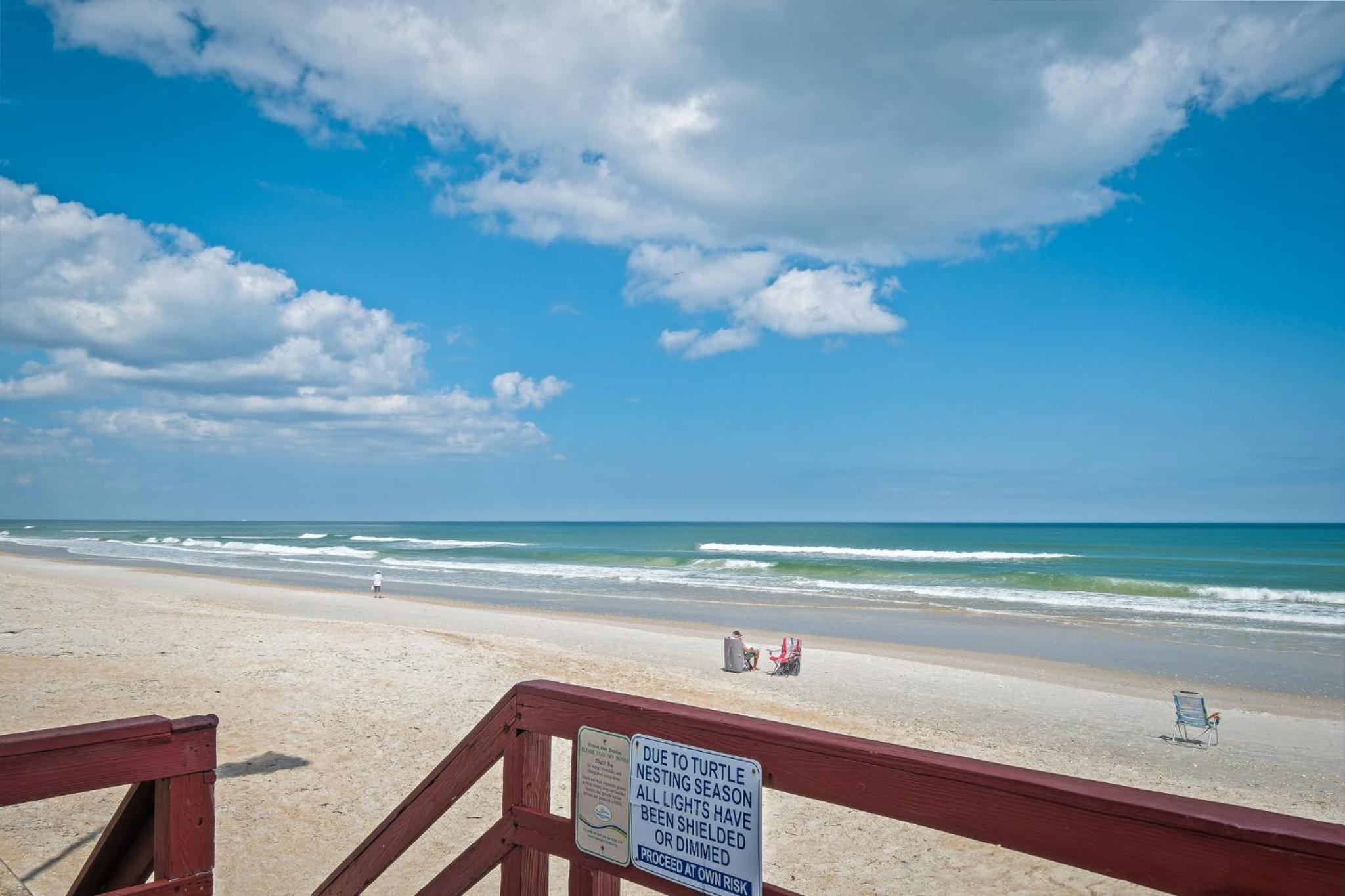 New listing! Direct oceanfront condo with a balcony, heated pool, and tennis court
