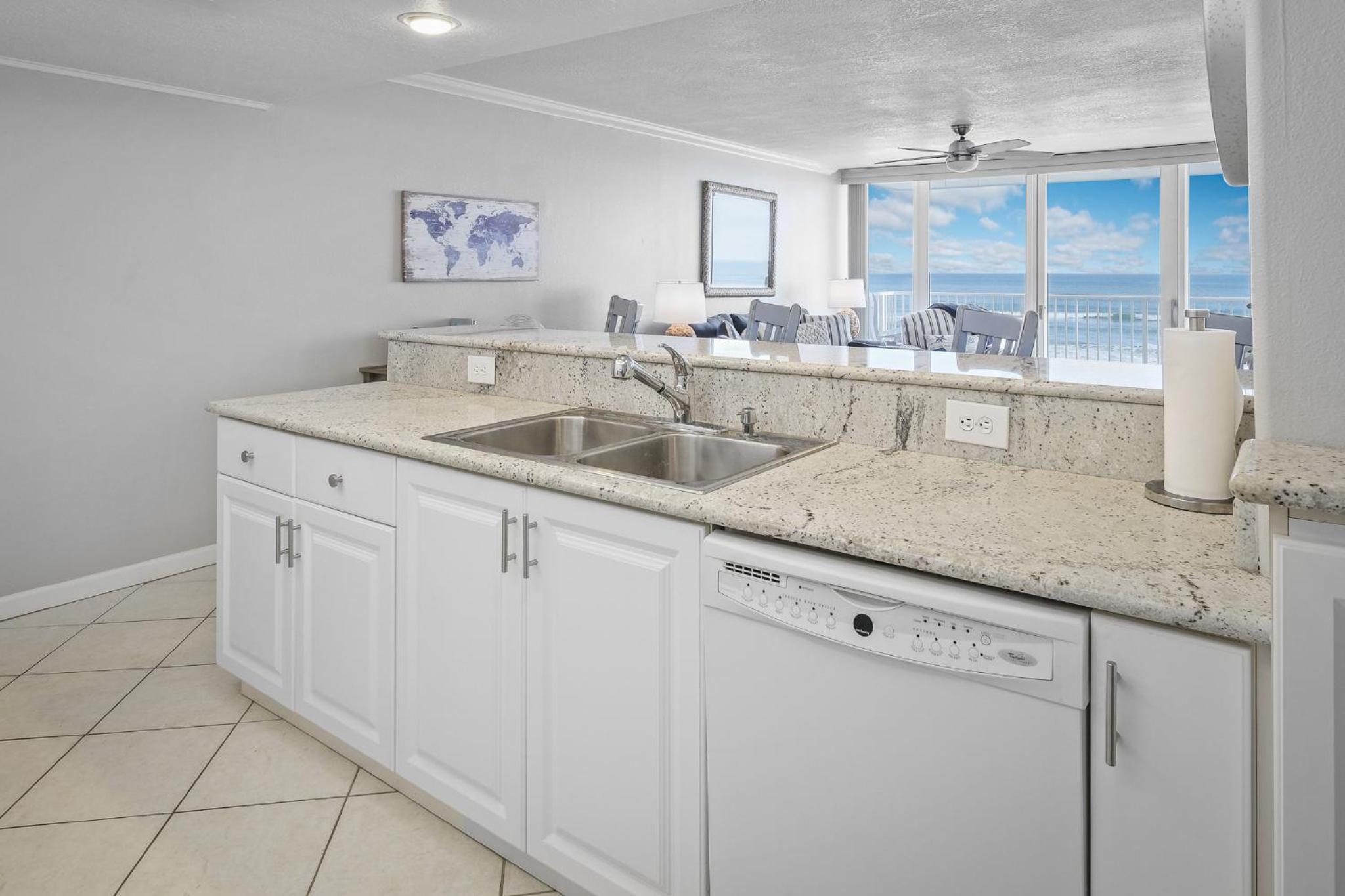 New listing! Direct oceanfront condo with a balcony, heated pool, and tennis court