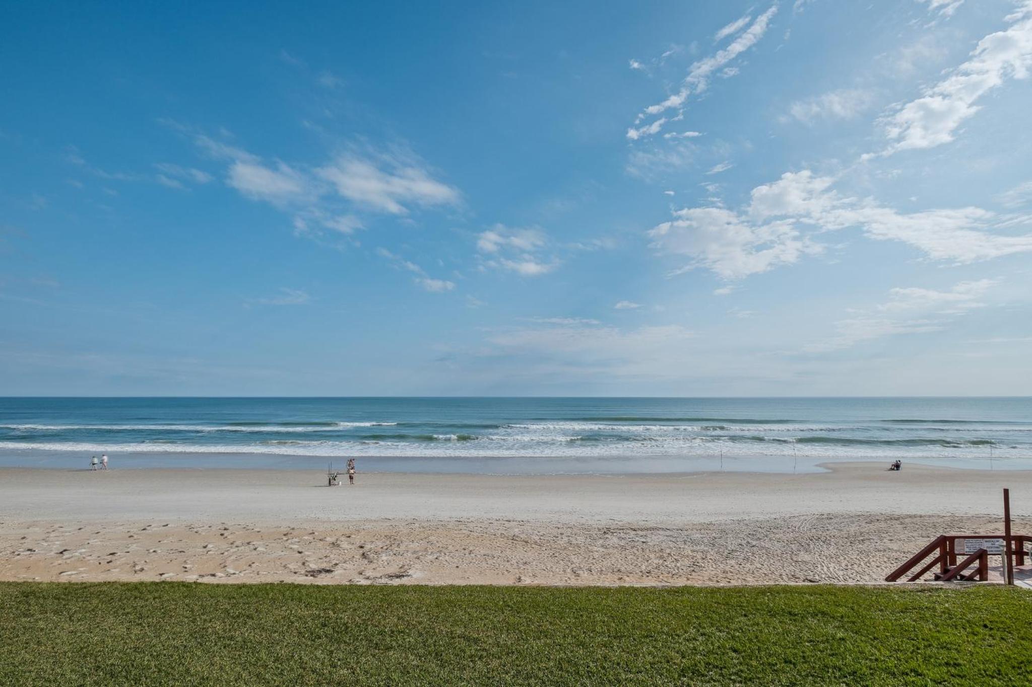 New listing! Direct oceanfront condo with a balcony, heated pool, and tennis court