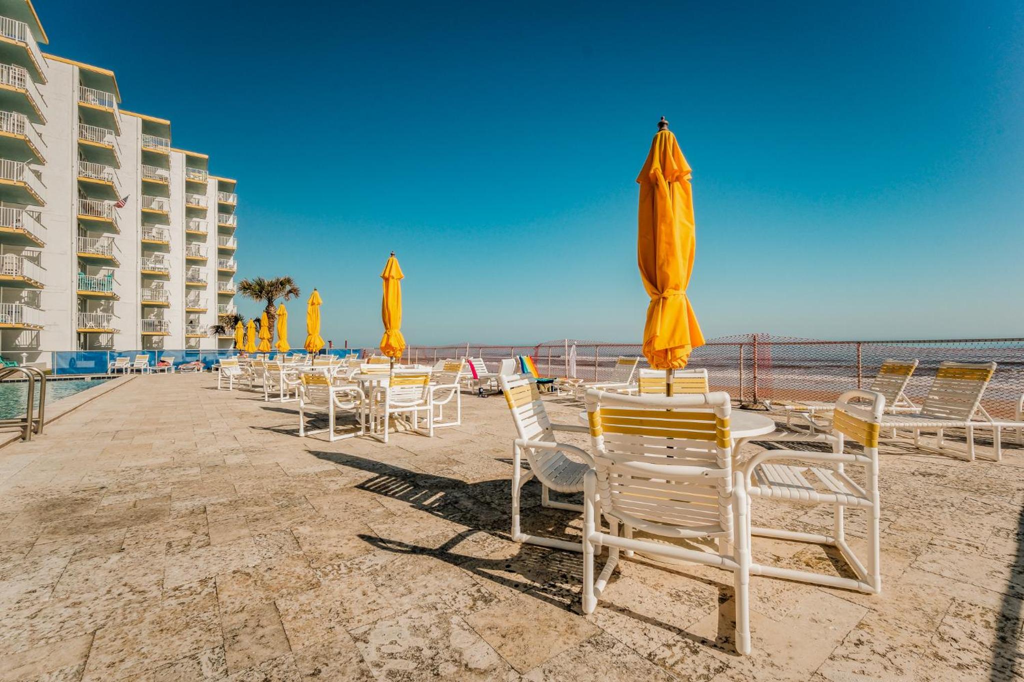 New listing! Direct oceanfront condo with a balcony, heated pool, and tennis court
