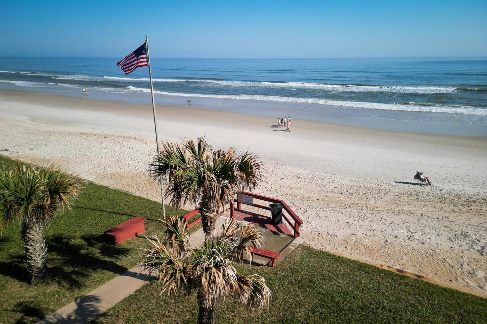 New listing! Direct oceanfront condo with a balcony, heated pool, and tennis court
