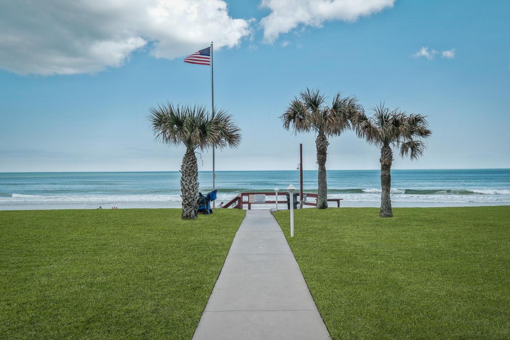 New listing! Direct oceanfront condo with a balcony, heated pool, and tennis court